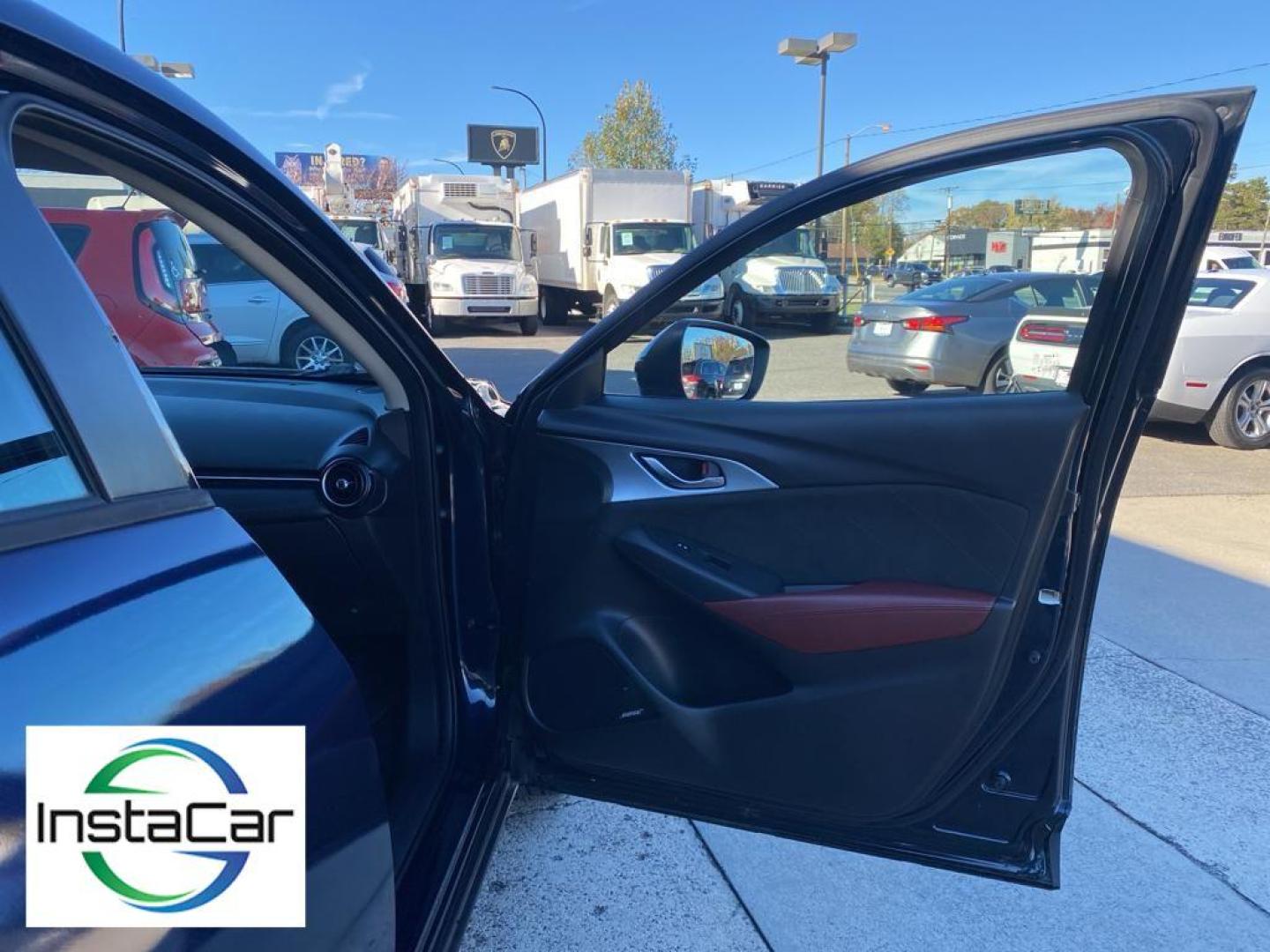 2017 Deep Crystal Blue Mica /Black Mazda CX-3 Grand Touring (JM1DKFD77H0) with an 4 Cyl, 2.0L engine, 6-speed automatic transmission, located at 3147 E Independence Blvd, Charlotte, NC, 28205, 35.200268, -80.773651 - Photo#23