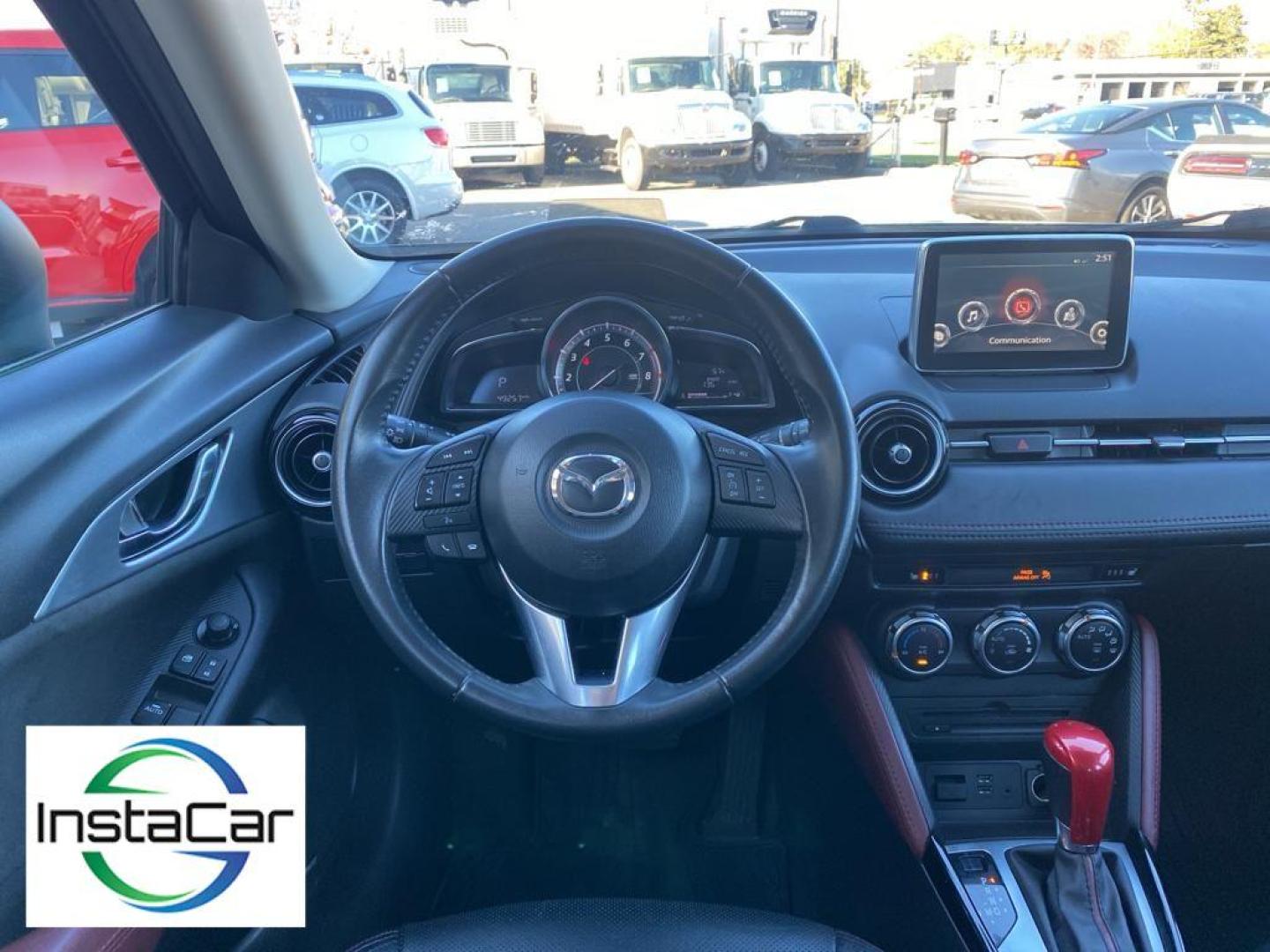 2017 Deep Crystal Blue Mica /Black Mazda CX-3 Grand Touring (JM1DKFD77H0) with an 4 Cyl, 2.0L engine, 6-speed automatic transmission, located at 3147 E Independence Blvd, Charlotte, NC, 28205, 35.200268, -80.773651 - Photo#29