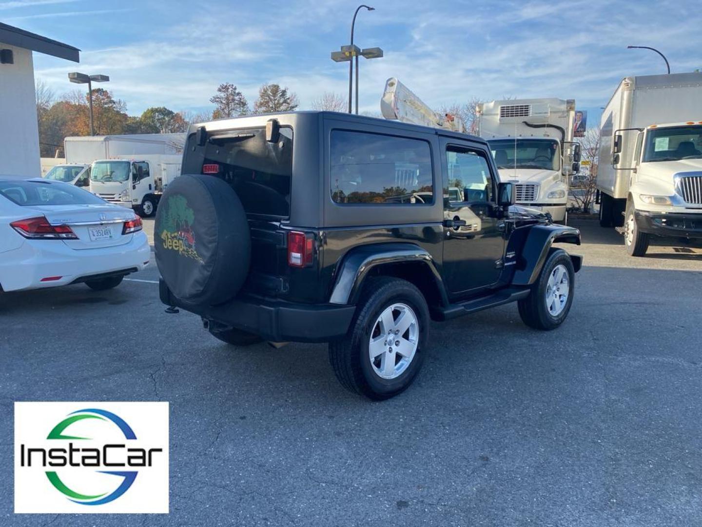 2012 Black Forest Green Pearlcoat /Black Jeep Wrangler Sahara (1C4AJWBG5CL) with an V6, 3.6L engine, 5-speed automatic transmission, located at 3147 E Independence Blvd, Charlotte, NC, 28205, 35.200268, -80.773651 - Discover the rugged sophistication of the 2012 Jeep Wrangler Sahara, a versatile SUV that seamlessly blends off-road capability with modern comfort. This pre-owned gem, featuring a robust V6, 3.6L engine, delivers impressive power and performance, making it the perfect companion for both urban commu - Photo#13