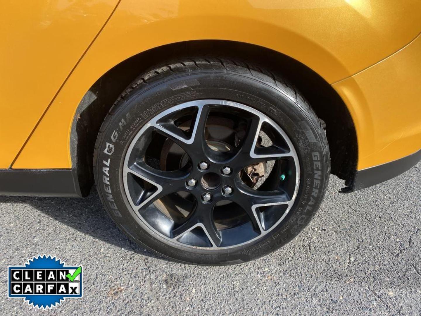 2012 Yellow Blaze Metallic Tri-coat /Charcoal Black w/Metal Gray Surround Ford Focus SE (1FAHP3K27CL) with an 4 Cyl, 2.0L engine, 6-speed auto-shift manual transmission, located at 3147 E Independence Blvd, Charlotte, NC, 28205, 35.200268, -80.773651 - For sale at our dealership is a well-maintained 2012 Ford Focus SE, perfect for those seeking a reliable and efficient vehicle. This compact sedan is equipped with a fuel-efficient 4-cylinder, 2.0L engine, providing a smooth and responsive driving experience. With front-wheel drive, the Focus SE off - Photo#17