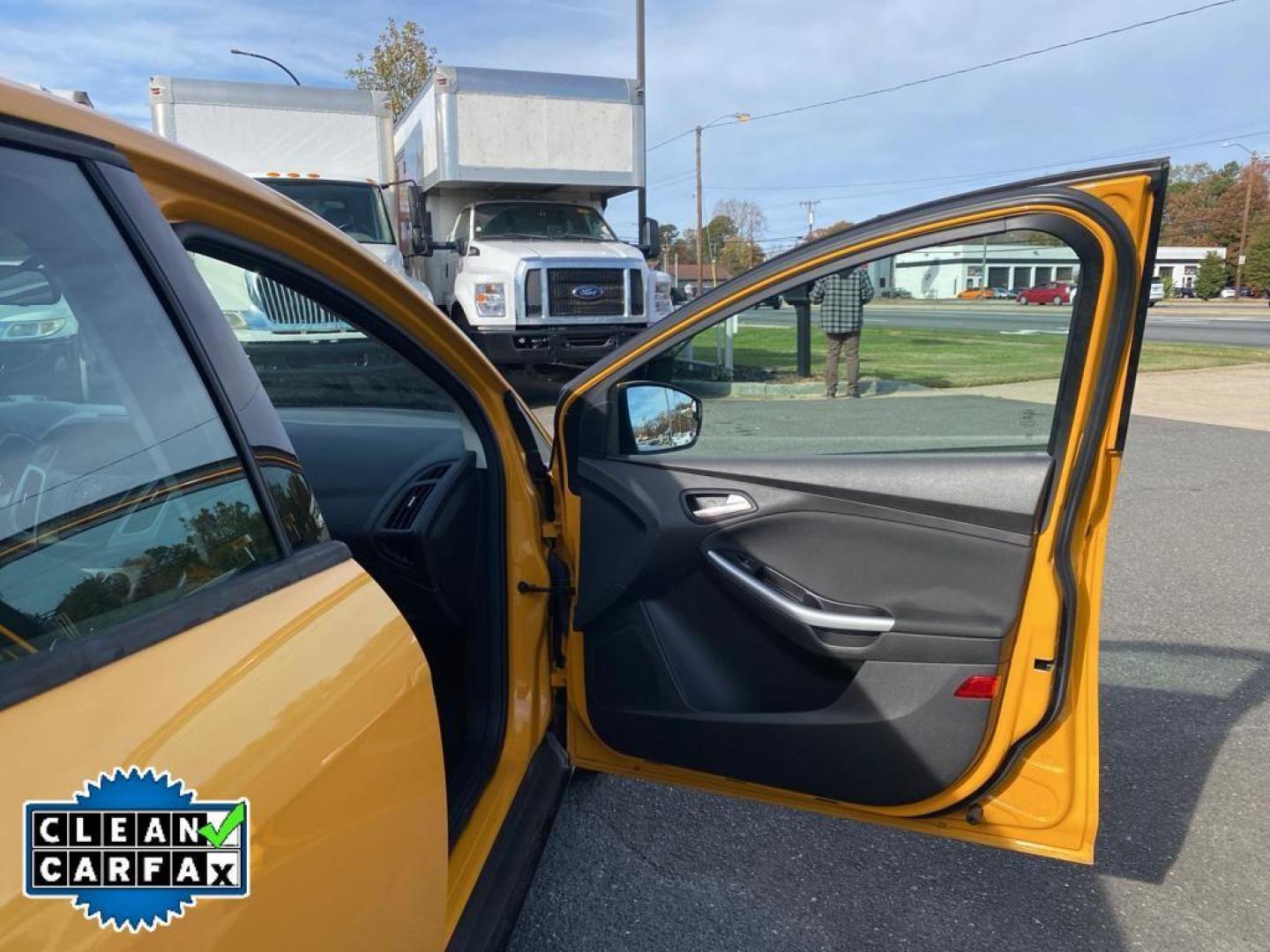 2012 Yellow Blaze Metallic Tri-coat /Charcoal Black w/Metal Gray Surround Ford Focus SE (1FAHP3K27CL) with an 4 Cyl, 2.0L engine, 6-speed auto-shift manual transmission, located at 3147 E Independence Blvd, Charlotte, NC, 28205, 35.200268, -80.773651 - For sale at our dealership is a well-maintained 2012 Ford Focus SE, perfect for those seeking a reliable and efficient vehicle. This compact sedan is equipped with a fuel-efficient 4-cylinder, 2.0L engine, providing a smooth and responsive driving experience. With front-wheel drive, the Focus SE off - Photo#22