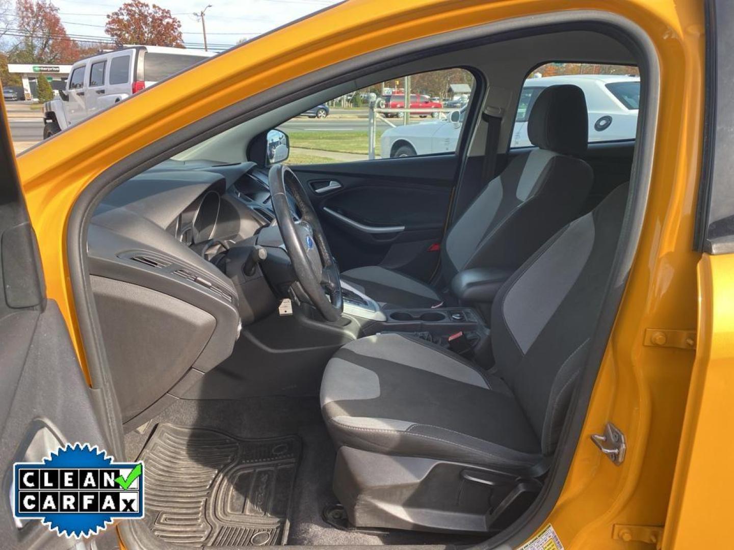 2012 Yellow Blaze Metallic Tri-coat /Charcoal Black w/Metal Gray Surround Ford Focus SE (1FAHP3K27CL) with an 4 Cyl, 2.0L engine, 6-speed auto-shift manual transmission, located at 3147 E Independence Blvd, Charlotte, NC, 28205, 35.200268, -80.773651 - For sale at our dealership is a well-maintained 2012 Ford Focus SE, perfect for those seeking a reliable and efficient vehicle. This compact sedan is equipped with a fuel-efficient 4-cylinder, 2.0L engine, providing a smooth and responsive driving experience. With front-wheel drive, the Focus SE off - Photo#23