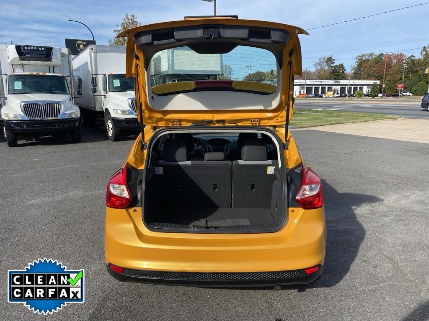 2012 Yellow Blaze Metallic Tri-coat /Charcoal Black w/Metal Gray Surround Ford Focus SE (1FAHP3K27CL) with an 4 Cyl, 2.0L engine, 6-speed auto-shift manual transmission, located at 3147 E Independence Blvd, Charlotte, NC, 28205, 35.200268, -80.773651 - For sale at our dealership is a well-maintained 2012 Ford Focus SE, perfect for those seeking a reliable and efficient vehicle. This compact sedan is equipped with a fuel-efficient 4-cylinder, 2.0L engine, providing a smooth and responsive driving experience. With front-wheel drive, the Focus SE off - Photo#29