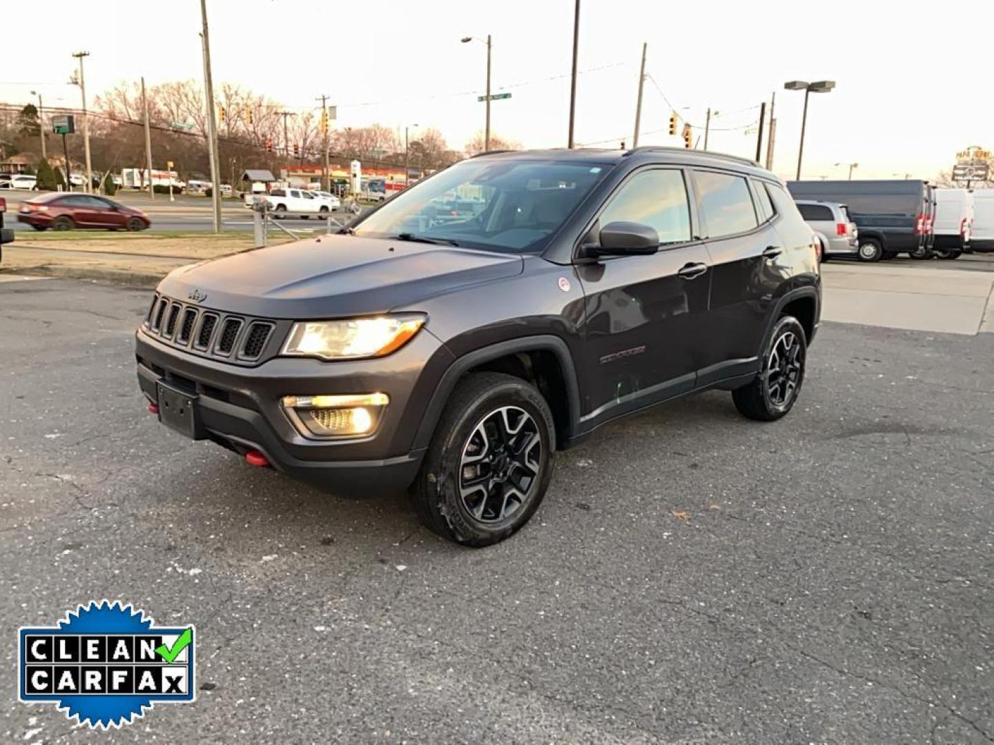 2021 Granite Crystal Metallic Clearcoat /Ruby Red/Black Jeep Compass Trailhawk (3C4NJDDB6MT) with an 4 Cyl, 2.4L engine, 9-speed automatic transmission, located at 3147 E Independence Blvd, Charlotte, NC, 28205, 35.200268, -80.773651 - <b>Equipment</b><br>The leather seats in it are a must for buyers looking for comfort, durability, and style. It's Forward Collision Warning feature alerts drivers to potential front-end collisions. The vehicle's Lane Departure Warning keeps you safe by alerting you when you drift from your lane. Th - Photo#9