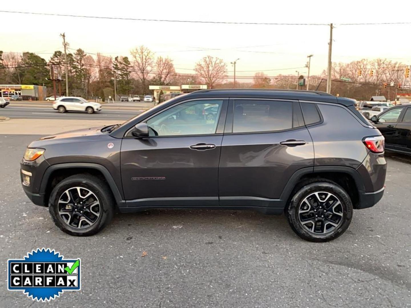 2021 Granite Crystal Metallic Clearcoat /Ruby Red/Black Jeep Compass Trailhawk (3C4NJDDB6MT) with an 4 Cyl, 2.4L engine, 9-speed automatic transmission, located at 3147 E Independence Blvd, Charlotte, NC, 28205, 35.200268, -80.773651 - <b>Equipment</b><br>The leather seats in it are a must for buyers looking for comfort, durability, and style. It's Forward Collision Warning feature alerts drivers to potential front-end collisions. The vehicle's Lane Departure Warning keeps you safe by alerting you when you drift from your lane. Th - Photo#10