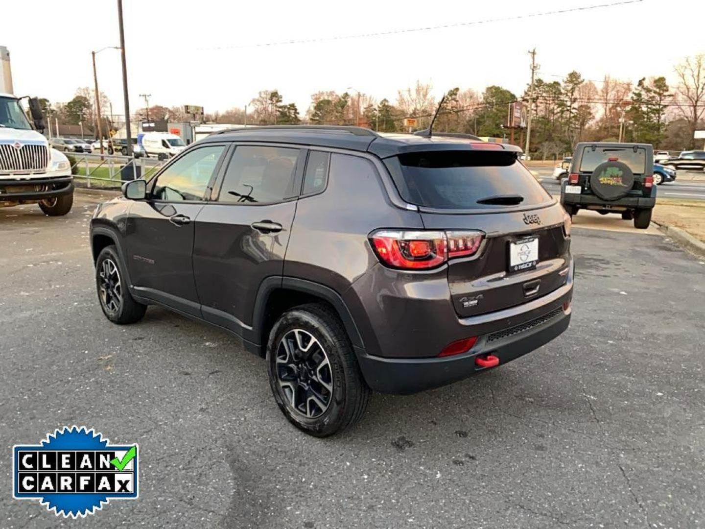 2021 Granite Crystal Metallic Clearcoat /Ruby Red/Black Jeep Compass Trailhawk (3C4NJDDB6MT) with an 4 Cyl, 2.4L engine, 9-speed automatic transmission, located at 3147 E Independence Blvd, Charlotte, NC, 28205, 35.200268, -80.773651 - <b>Equipment</b><br>The leather seats in it are a must for buyers looking for comfort, durability, and style. It's Forward Collision Warning feature alerts drivers to potential front-end collisions. The vehicle's Lane Departure Warning keeps you safe by alerting you when you drift from your lane. Th - Photo#11