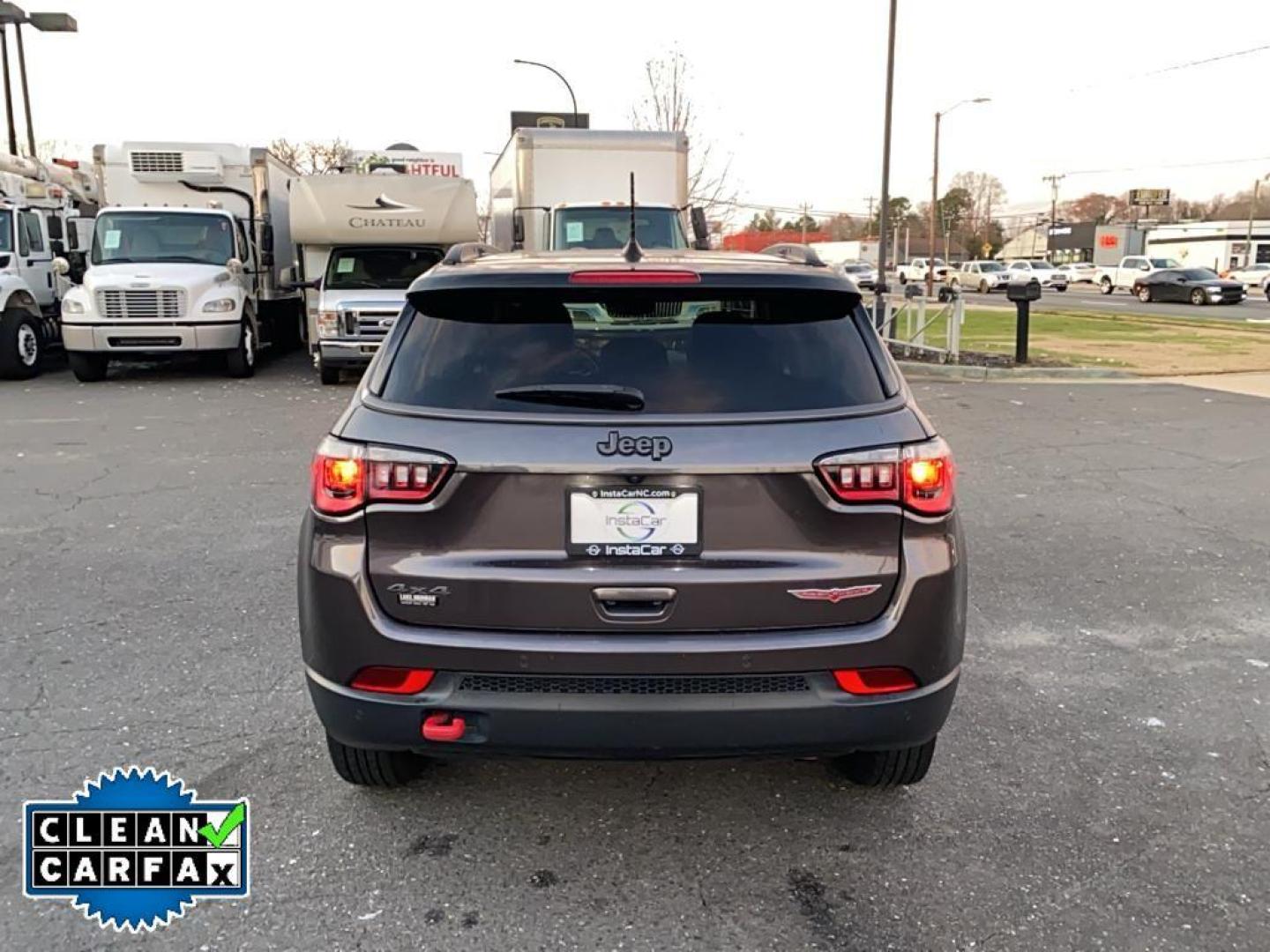 2021 Granite Crystal Metallic Clearcoat /Ruby Red/Black Jeep Compass Trailhawk (3C4NJDDB6MT) with an 4 Cyl, 2.4L engine, 9-speed automatic transmission, located at 3147 E Independence Blvd, Charlotte, NC, 28205, 35.200268, -80.773651 - <b>Equipment</b><br>The leather seats in it are a must for buyers looking for comfort, durability, and style. It's Forward Collision Warning feature alerts drivers to potential front-end collisions. The vehicle's Lane Departure Warning keeps you safe by alerting you when you drift from your lane. Th - Photo#12