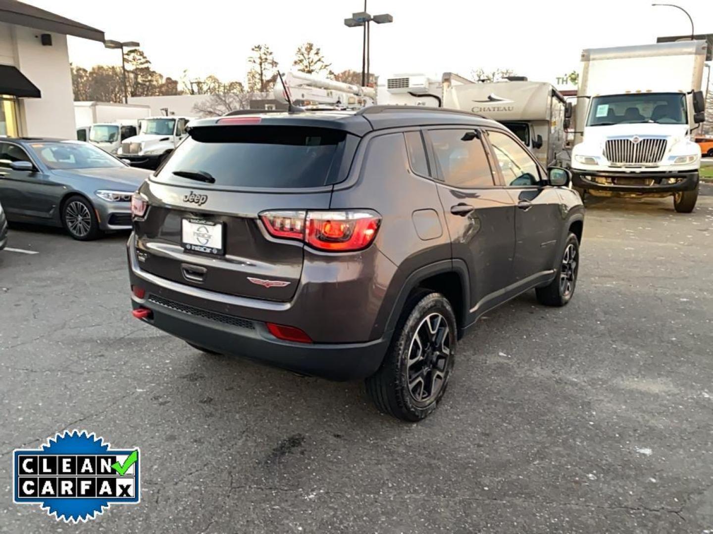 2021 Granite Crystal Metallic Clearcoat /Ruby Red/Black Jeep Compass Trailhawk (3C4NJDDB6MT) with an 4 Cyl, 2.4L engine, 9-speed automatic transmission, located at 3147 E Independence Blvd, Charlotte, NC, 28205, 35.200268, -80.773651 - <b>Equipment</b><br>The leather seats in it are a must for buyers looking for comfort, durability, and style. It's Forward Collision Warning feature alerts drivers to potential front-end collisions. The vehicle's Lane Departure Warning keeps you safe by alerting you when you drift from your lane. Th - Photo#13