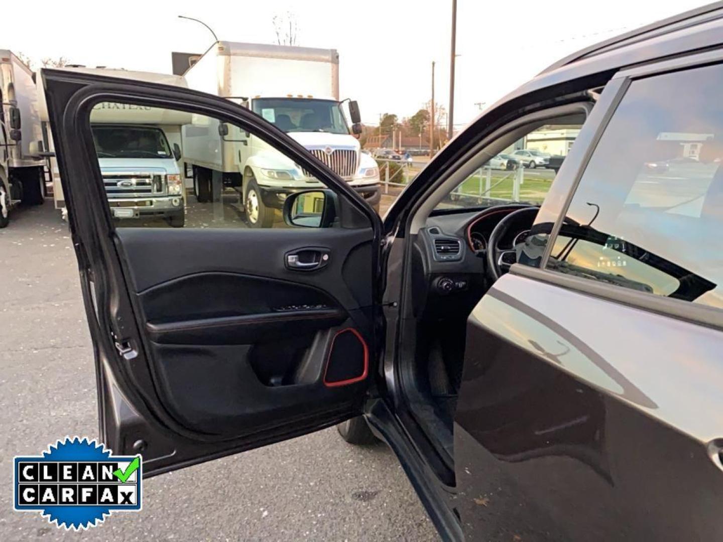 2021 Granite Crystal Metallic Clearcoat /Ruby Red/Black Jeep Compass Trailhawk (3C4NJDDB6MT) with an 4 Cyl, 2.4L engine, 9-speed automatic transmission, located at 3147 E Independence Blvd, Charlotte, NC, 28205, 35.200268, -80.773651 - <b>Equipment</b><br>The leather seats in it are a must for buyers looking for comfort, durability, and style. It's Forward Collision Warning feature alerts drivers to potential front-end collisions. The vehicle's Lane Departure Warning keeps you safe by alerting you when you drift from your lane. Th - Photo#19