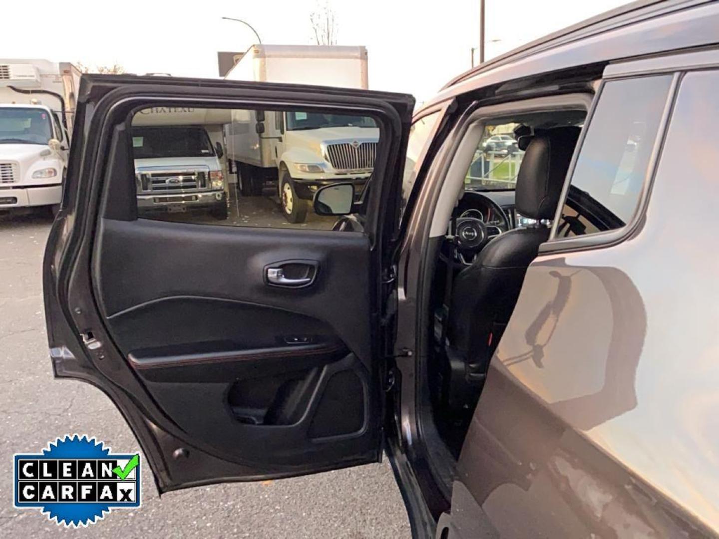 2021 Granite Crystal Metallic Clearcoat /Ruby Red/Black Jeep Compass Trailhawk (3C4NJDDB6MT) with an 4 Cyl, 2.4L engine, 9-speed automatic transmission, located at 3147 E Independence Blvd, Charlotte, NC, 28205, 35.200268, -80.773651 - <b>Equipment</b><br>The leather seats in it are a must for buyers looking for comfort, durability, and style. It's Forward Collision Warning feature alerts drivers to potential front-end collisions. The vehicle's Lane Departure Warning keeps you safe by alerting you when you drift from your lane. Th - Photo#21