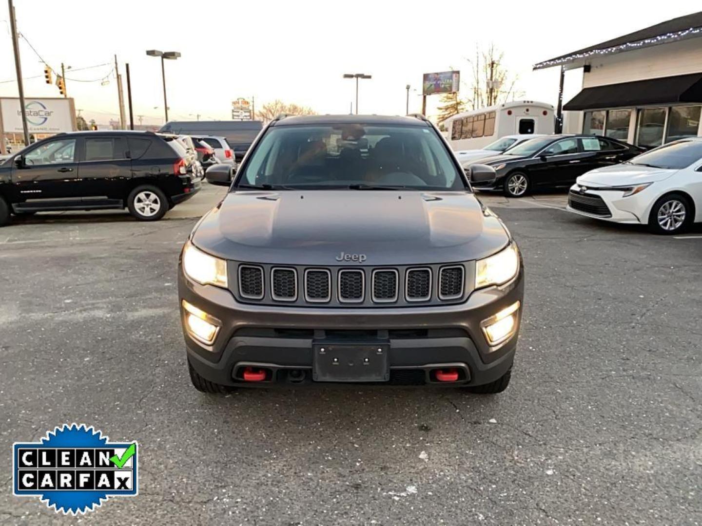 2021 Granite Crystal Metallic Clearcoat /Ruby Red/Black Jeep Compass Trailhawk (3C4NJDDB6MT) with an 4 Cyl, 2.4L engine, 9-speed automatic transmission, located at 3147 E Independence Blvd, Charlotte, NC, 28205, 35.200268, -80.773651 - <b>Equipment</b><br>The leather seats in it are a must for buyers looking for comfort, durability, and style. It's Forward Collision Warning feature alerts drivers to potential front-end collisions. The vehicle's Lane Departure Warning keeps you safe by alerting you when you drift from your lane. Th - Photo#8