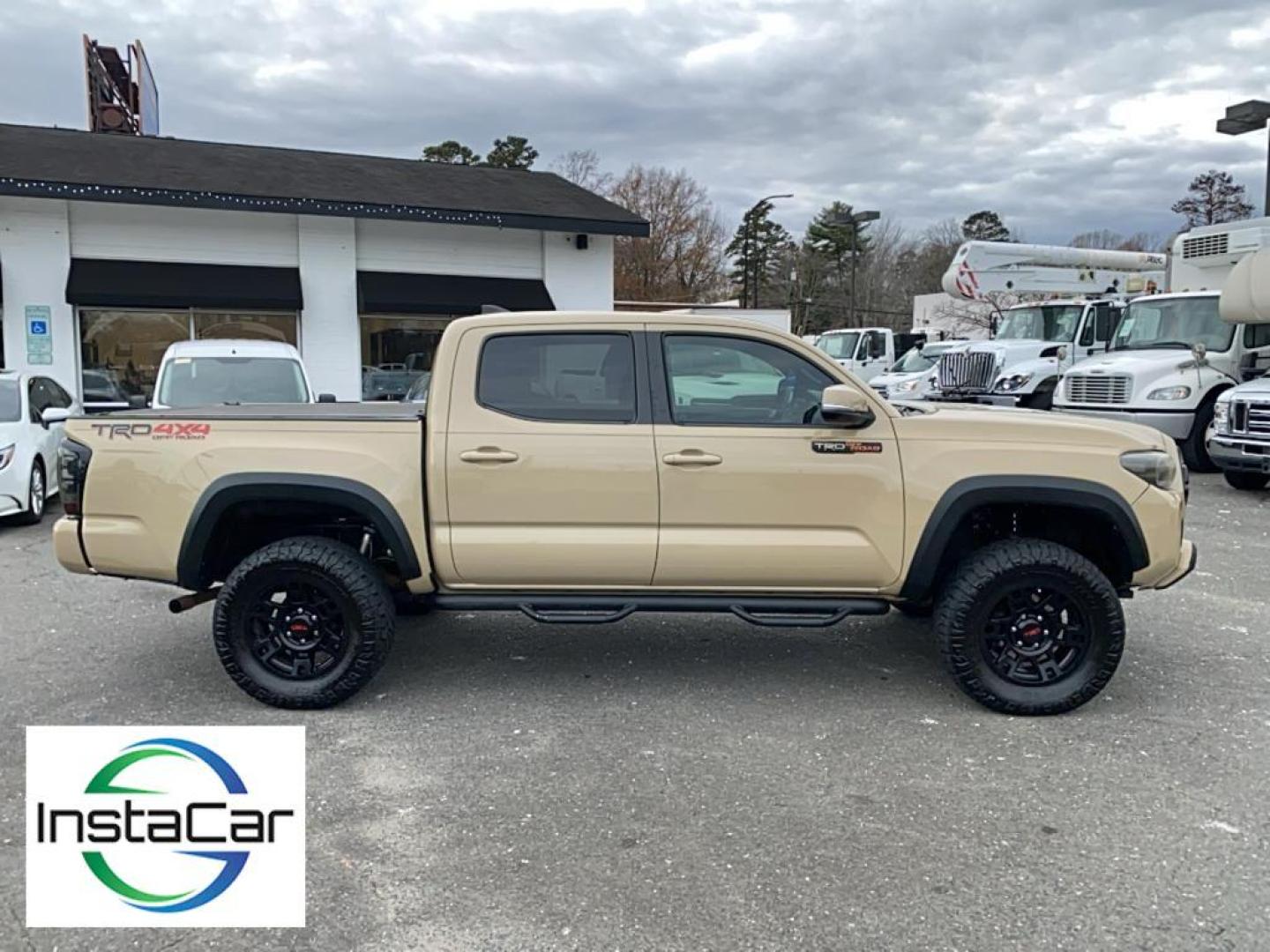 2016 Quicksand /Graphite w/Gun Metal Toyota Tacoma TRD Off Road (3TMCZ5AN4GM) with an V6, 3.5L engine, 6-speed automatic transmission, located at 3147 E Independence Blvd, Charlotte, NC, 28205, 35.200268, -80.773651 - Introducing the 2016 Toyota Tacoma TRD Off Road, an exceptional blend of power, versatility, and advanced technology, perfect for tackling any terrain with confidence. This capable 4WD pickup is powered by a robust V6, 3.5L engine, ensuring a dynamic driving experience whether you're navigating city - Photo#16