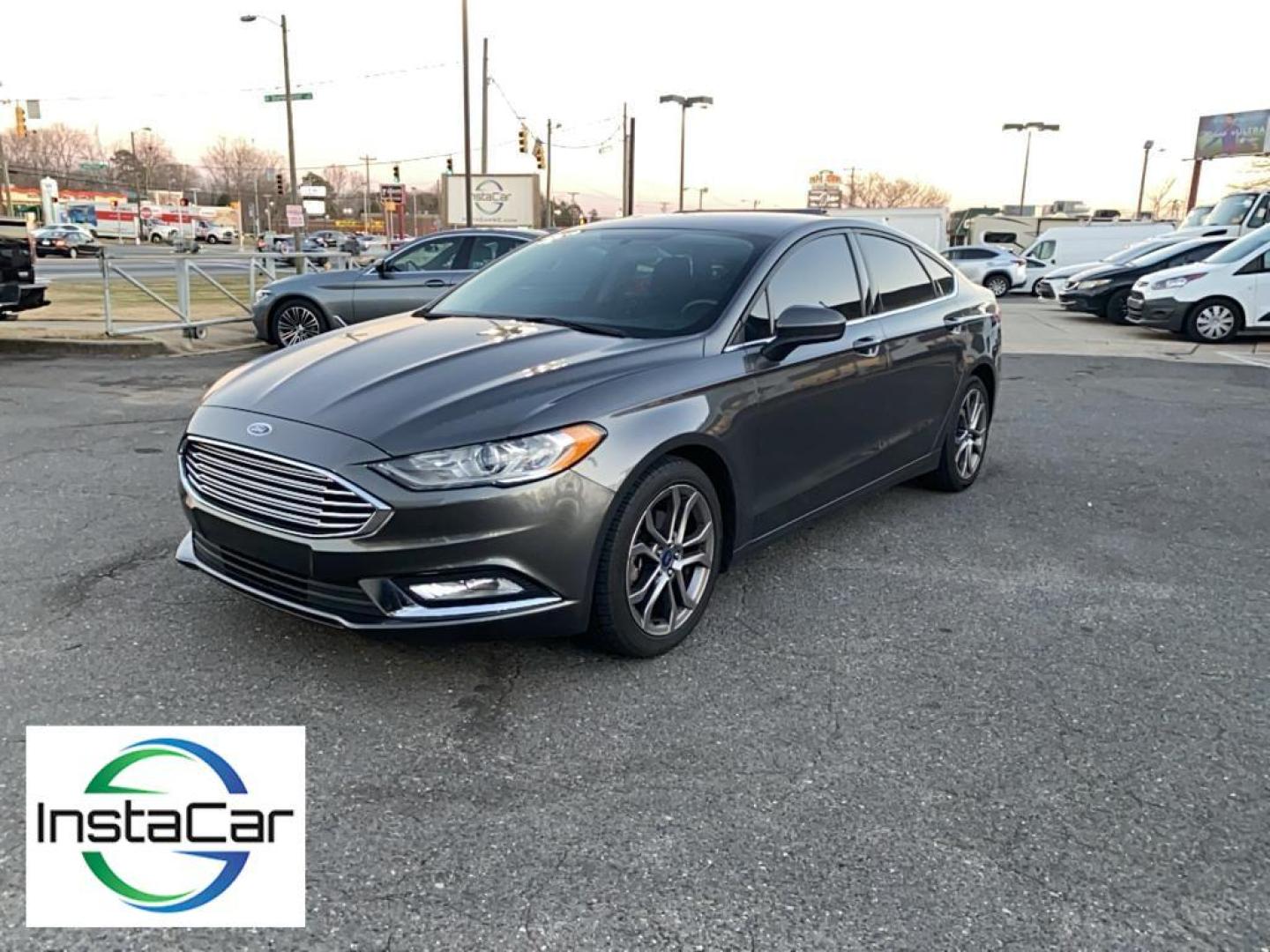 2017 Gray Ford Fusion S (3FA6P0G78HR) with an 4 Cyl, 2.5L engine, Automatic transmission, located at 3147 E Independence Blvd, Charlotte, NC, 28205, 35.200268, -80.773651 - <b>Equipment</b><br>Bluetooth technology is built into this Ford Fusion, keeping your hands on the steering wheel and your focus on the road. Protect this model from unwanted accidents with a cutting edge backup camera system. Quickly unlock this Ford Fusion with keyless entry. This mid-size car is - Photo#8