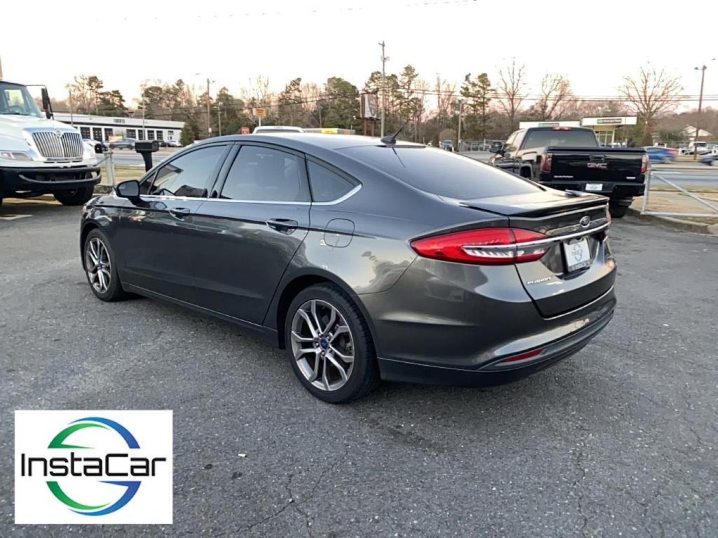 2017 Gray Ford Fusion S (3FA6P0G78HR) with an 4 Cyl, 2.5L engine, Automatic transmission, located at 3147 E Independence Blvd, Charlotte, NC, 28205, 35.200268, -80.773651 - <b>Equipment</b><br>Bluetooth technology is built into this Ford Fusion, keeping your hands on the steering wheel and your focus on the road. Protect this model from unwanted accidents with a cutting edge backup camera system. Quickly unlock this Ford Fusion with keyless entry. This mid-size car is - Photo#10