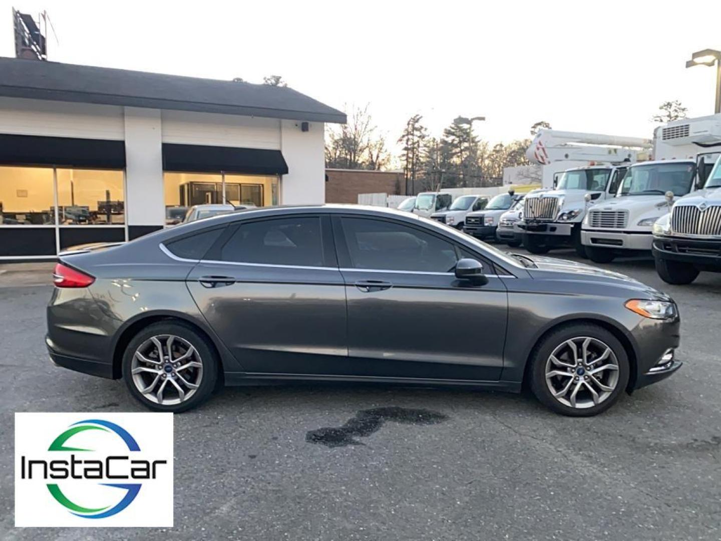 2017 Gray Ford Fusion S (3FA6P0G78HR) with an 4 Cyl, 2.5L engine, Automatic transmission, located at 3147 E Independence Blvd, Charlotte, NC, 28205, 35.200268, -80.773651 - <b>Equipment</b><br>Bluetooth technology is built into this Ford Fusion, keeping your hands on the steering wheel and your focus on the road. Protect this model from unwanted accidents with a cutting edge backup camera system. Quickly unlock this Ford Fusion with keyless entry. This mid-size car is - Photo#13