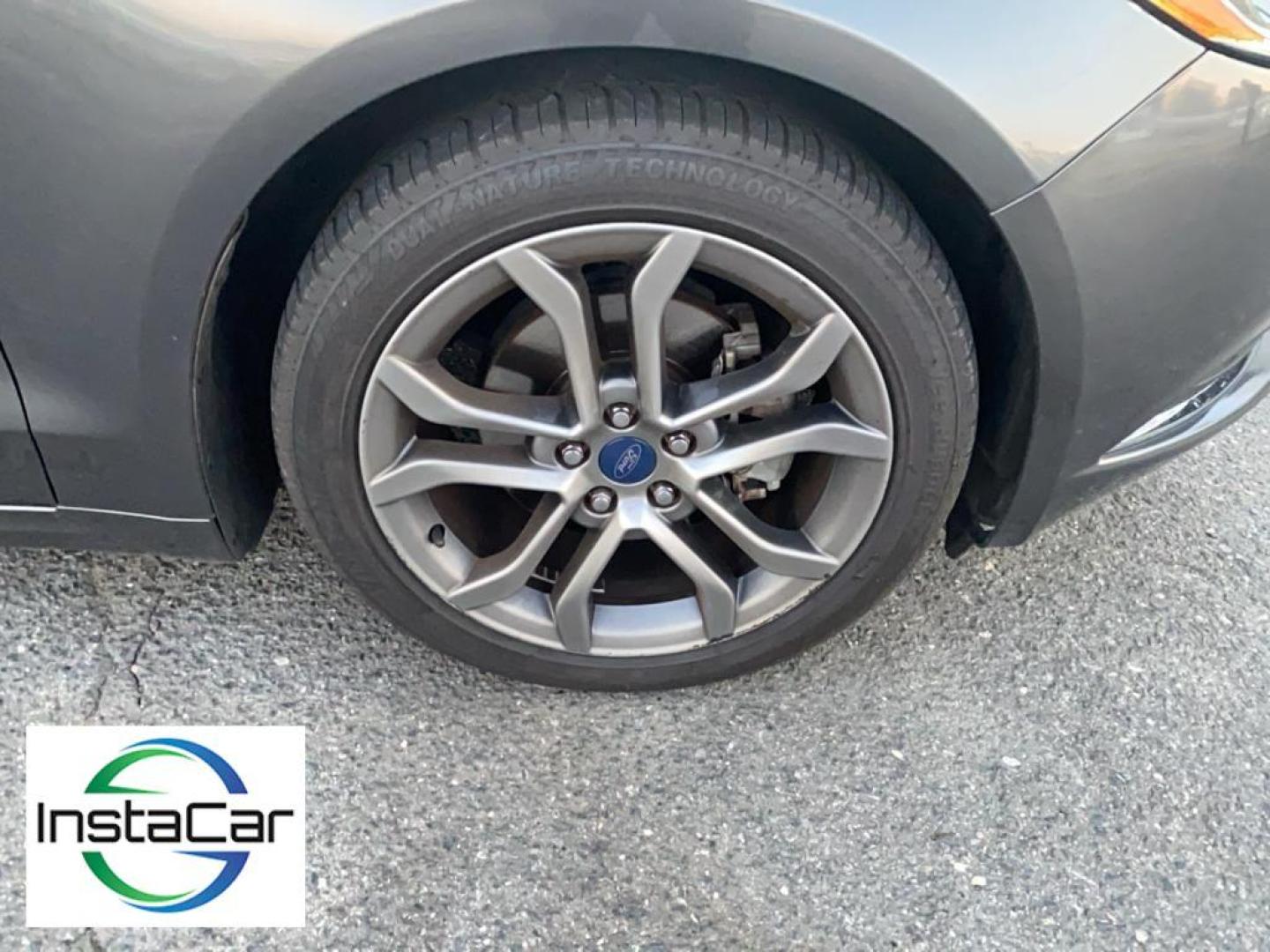 2017 Gray Ford Fusion S (3FA6P0G78HR) with an 4 Cyl, 2.5L engine, Automatic transmission, located at 3147 E Independence Blvd, Charlotte, NC, 28205, 35.200268, -80.773651 - <b>Equipment</b><br>Bluetooth technology is built into this Ford Fusion, keeping your hands on the steering wheel and your focus on the road. Protect this model from unwanted accidents with a cutting edge backup camera system. Quickly unlock this Ford Fusion with keyless entry. This mid-size car is - Photo#15