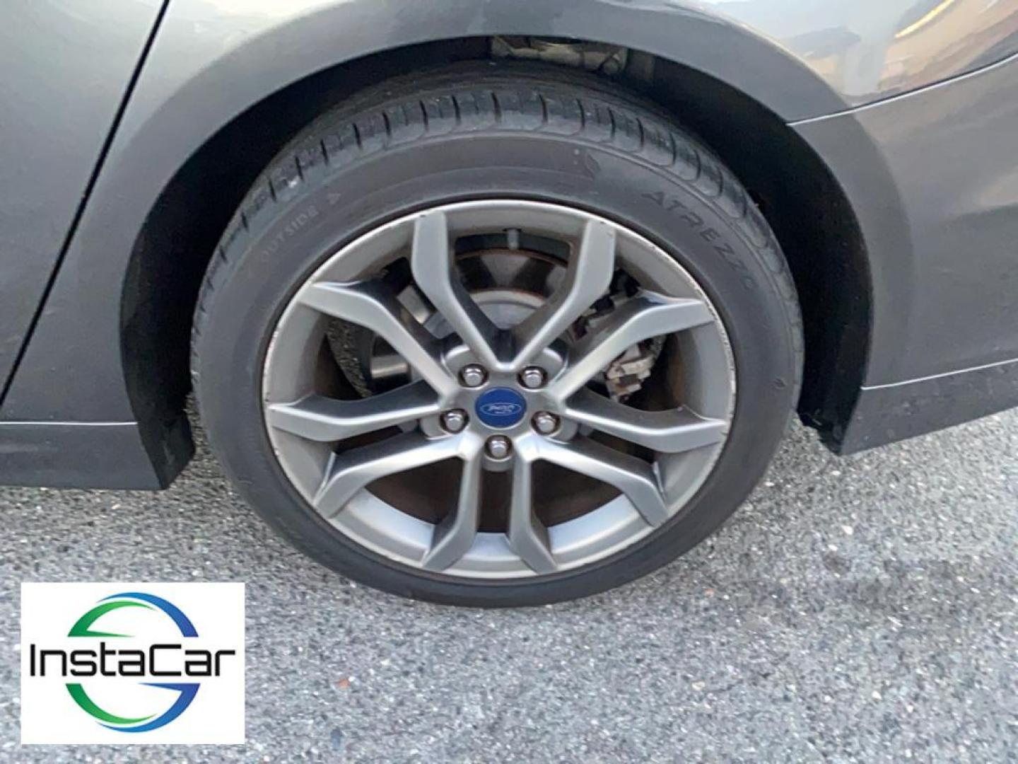 2017 Gray Ford Fusion S (3FA6P0G78HR) with an 4 Cyl, 2.5L engine, Automatic transmission, located at 3147 E Independence Blvd, Charlotte, NC, 28205, 35.200268, -80.773651 - <b>Equipment</b><br>Bluetooth technology is built into this Ford Fusion, keeping your hands on the steering wheel and your focus on the road. Protect this model from unwanted accidents with a cutting edge backup camera system. Quickly unlock this Ford Fusion with keyless entry. This mid-size car is - Photo#17