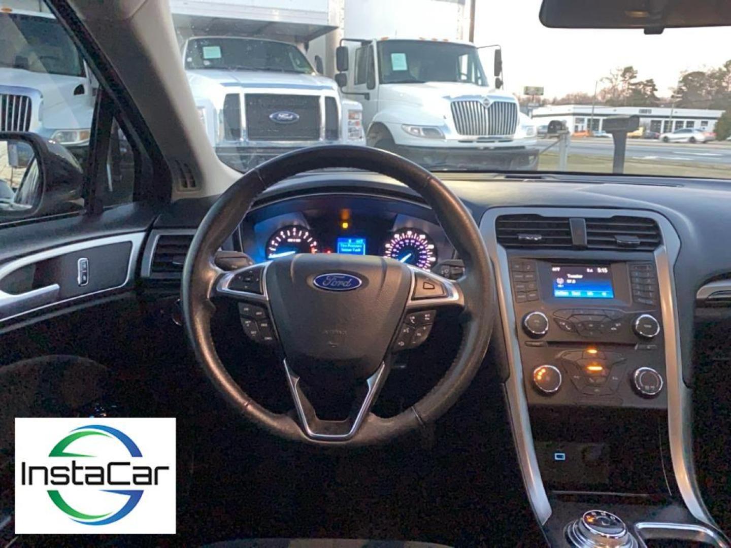 2017 Gray Ford Fusion S (3FA6P0G78HR) with an 4 Cyl, 2.5L engine, Automatic transmission, located at 3147 E Independence Blvd, Charlotte, NC, 28205, 35.200268, -80.773651 - <b>Equipment</b><br>Bluetooth technology is built into this Ford Fusion, keeping your hands on the steering wheel and your focus on the road. Protect this model from unwanted accidents with a cutting edge backup camera system. Quickly unlock this Ford Fusion with keyless entry. This mid-size car is - Photo#28