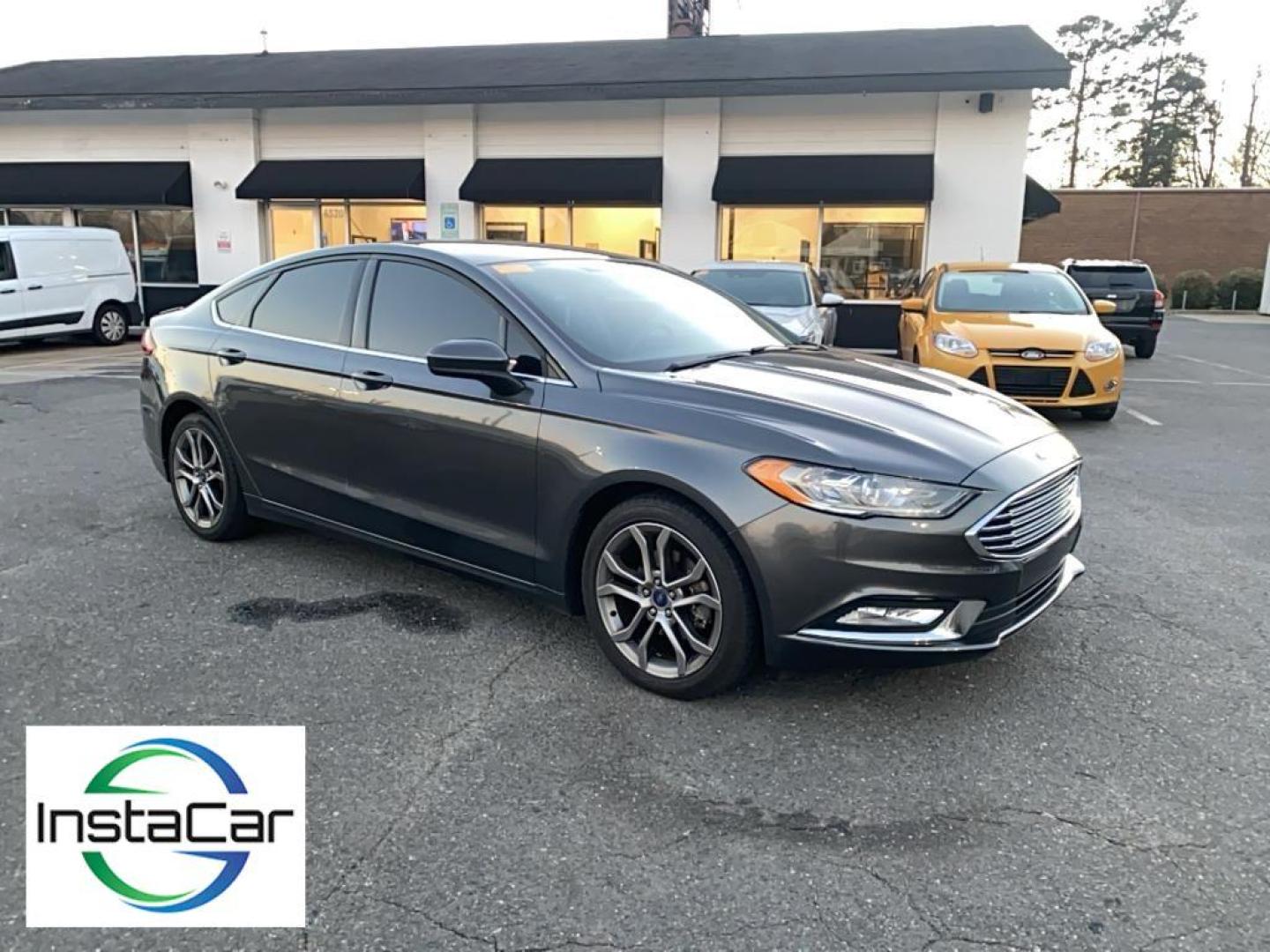 2017 Gray Ford Fusion S (3FA6P0G78HR) with an 4 Cyl, 2.5L engine, Automatic transmission, located at 3147 E Independence Blvd, Charlotte, NC, 28205, 35.200268, -80.773651 - <b>Equipment</b><br>Bluetooth technology is built into this Ford Fusion, keeping your hands on the steering wheel and your focus on the road. Protect this model from unwanted accidents with a cutting edge backup camera system. Quickly unlock this Ford Fusion with keyless entry. This mid-size car is - Photo#6