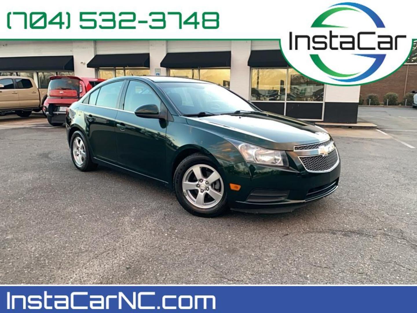 2014 Rainforest Green Metallic /Jet Black Chevrolet Cruze 1LT (1G1PC5SB1E7) with an 4 Cyl, 1.4L engine, 6-speed automatic transmission, located at 3147 E Independence Blvd, Charlotte, NC, 28205, 35.200268, -80.773651 - Rev up your excitement with the 2014 Chevrolet Cruze 1LT, a perfect blend of style, efficiency, and modern technology! This dynamic sedan, featuring a powerful yet fuel-efficient 1.4L 4-cylinder engine, is your ticket to a smooth and exhilarating driving experience. With Front-Wheel Drive, this Cruz - Photo#0