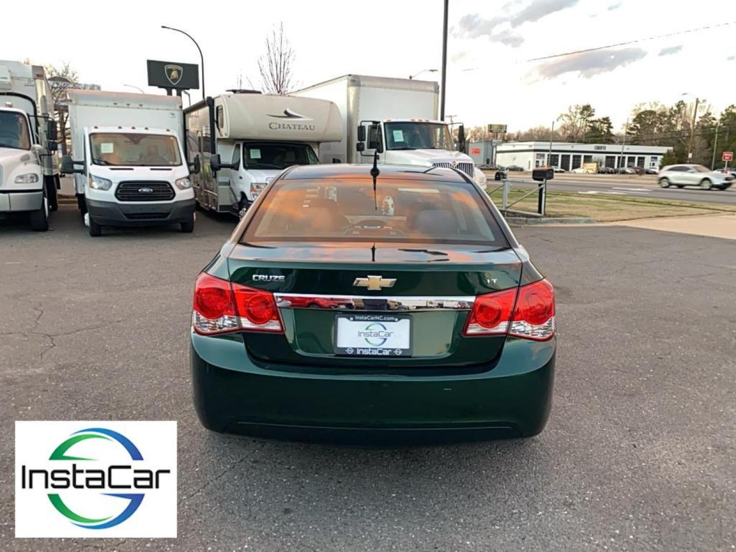 2014 Rainforest Green Metallic /Jet Black Chevrolet Cruze 1LT (1G1PC5SB1E7) with an 4 Cyl, 1.4L engine, 6-speed automatic transmission, located at 3147 E Independence Blvd, Charlotte, NC, 28205, 35.200268, -80.773651 - Rev up your excitement with the 2014 Chevrolet Cruze 1LT, a perfect blend of style, efficiency, and modern technology! This dynamic sedan, featuring a powerful yet fuel-efficient 1.4L 4-cylinder engine, is your ticket to a smooth and exhilarating driving experience. With Front-Wheel Drive, this Cruz - Photo#11