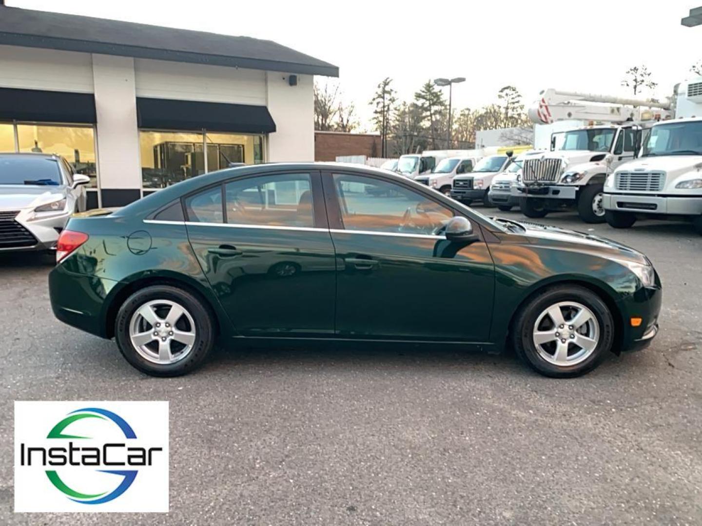 2014 Rainforest Green Metallic /Jet Black Chevrolet Cruze 1LT (1G1PC5SB1E7) with an 4 Cyl, 1.4L engine, 6-speed automatic transmission, located at 3147 E Independence Blvd, Charlotte, NC, 28205, 35.200268, -80.773651 - Photo#13