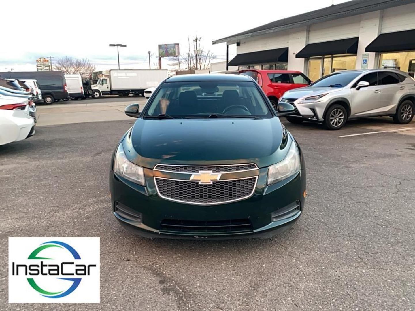 2014 Rainforest Green Metallic /Jet Black Chevrolet Cruze 1LT (1G1PC5SB1E7) with an 4 Cyl, 1.4L engine, 6-speed automatic transmission, located at 3147 E Independence Blvd, Charlotte, NC, 28205, 35.200268, -80.773651 - Photo#7