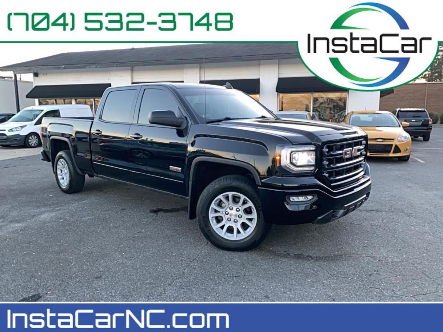 2017 Onyx Black /Jet Black/Spice Red GMC Sierra SLT (3GTU2NEC6HG) with an V8, 5.3L engine, 8-speed automatic transmission, located at 3147 E Independence Blvd, Charlotte, NC, 28205, 35.200268, -80.773651 - Photo#0