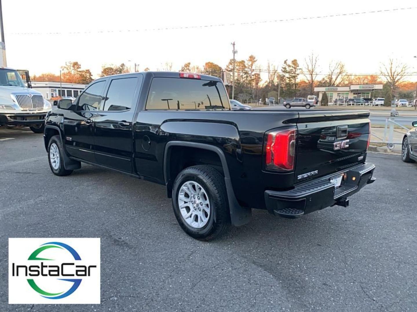 2017 Onyx Black /Jet Black/Spice Red GMC Sierra SLT (3GTU2NEC6HG) with an V8, 5.3L engine, 8-speed automatic transmission, located at 3147 E Independence Blvd, Charlotte, NC, 28205, 35.200268, -80.773651 - Photo#10