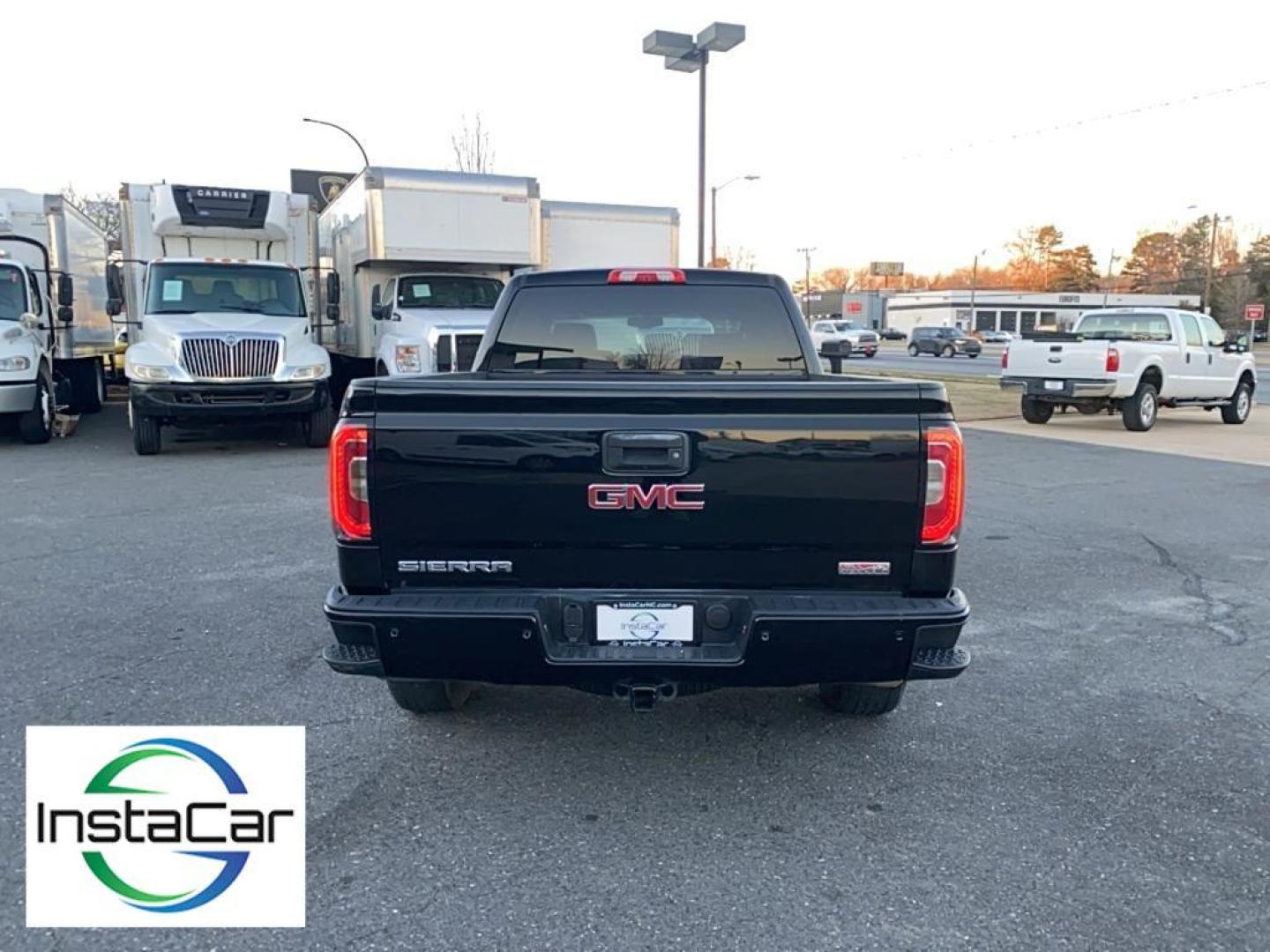 2017 Onyx Black /Jet Black/Spice Red GMC Sierra SLT (3GTU2NEC6HG) with an V8, 5.3L engine, 8-speed automatic transmission, located at 3147 E Independence Blvd, Charlotte, NC, 28205, 35.200268, -80.773651 - Photo#11