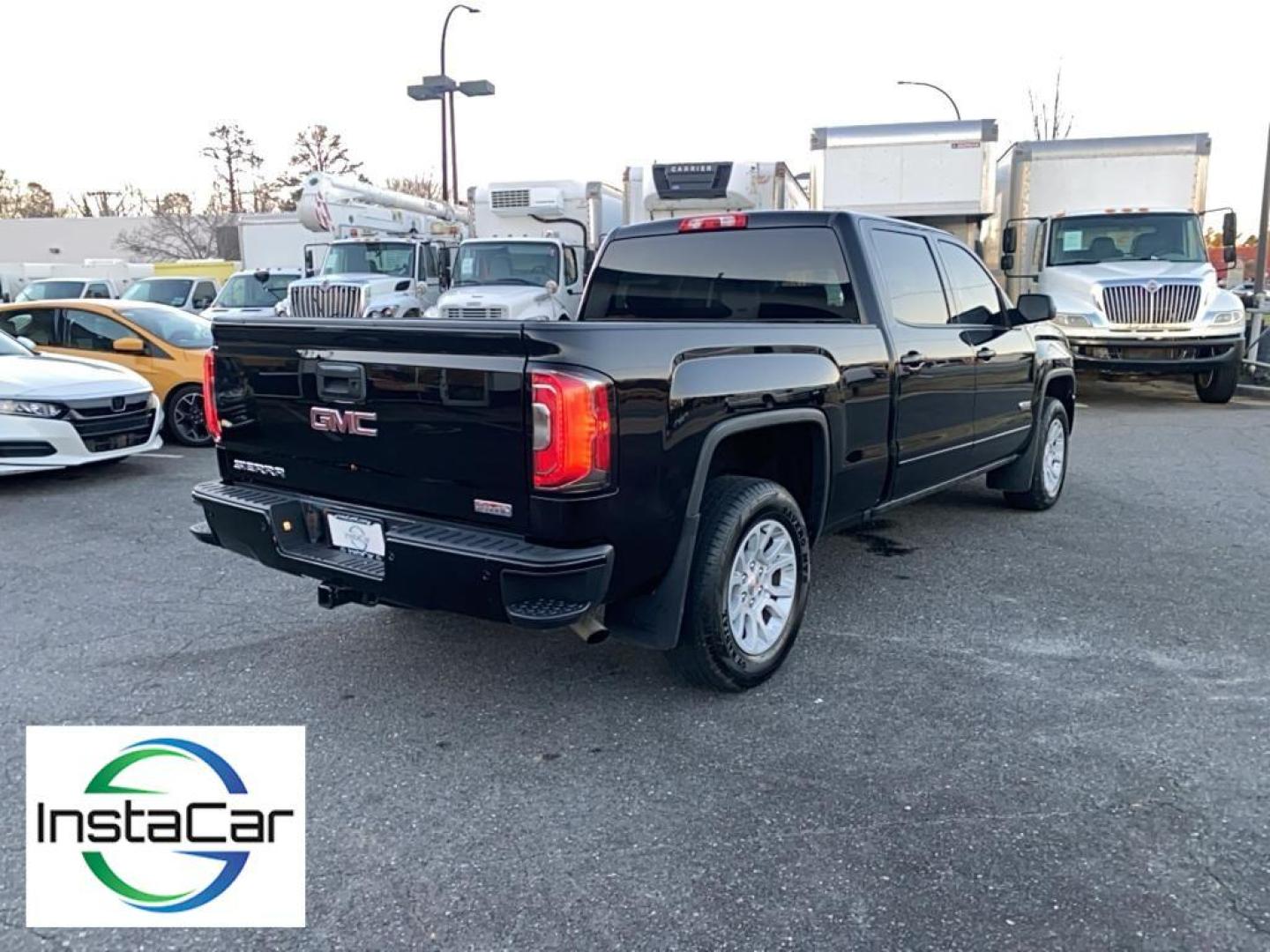 2017 Onyx Black /Jet Black/Spice Red GMC Sierra SLT (3GTU2NEC6HG) with an V8, 5.3L engine, 8-speed automatic transmission, located at 3147 E Independence Blvd, Charlotte, NC, 28205, 35.200268, -80.773651 - Photo#12