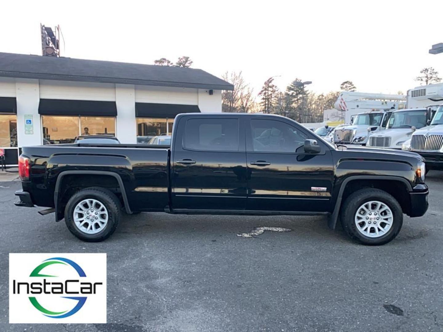 2017 Onyx Black /Jet Black/Spice Red GMC Sierra SLT (3GTU2NEC6HG) with an V8, 5.3L engine, 8-speed automatic transmission, located at 3147 E Independence Blvd, Charlotte, NC, 28205, 35.200268, -80.773651 - Photo#13