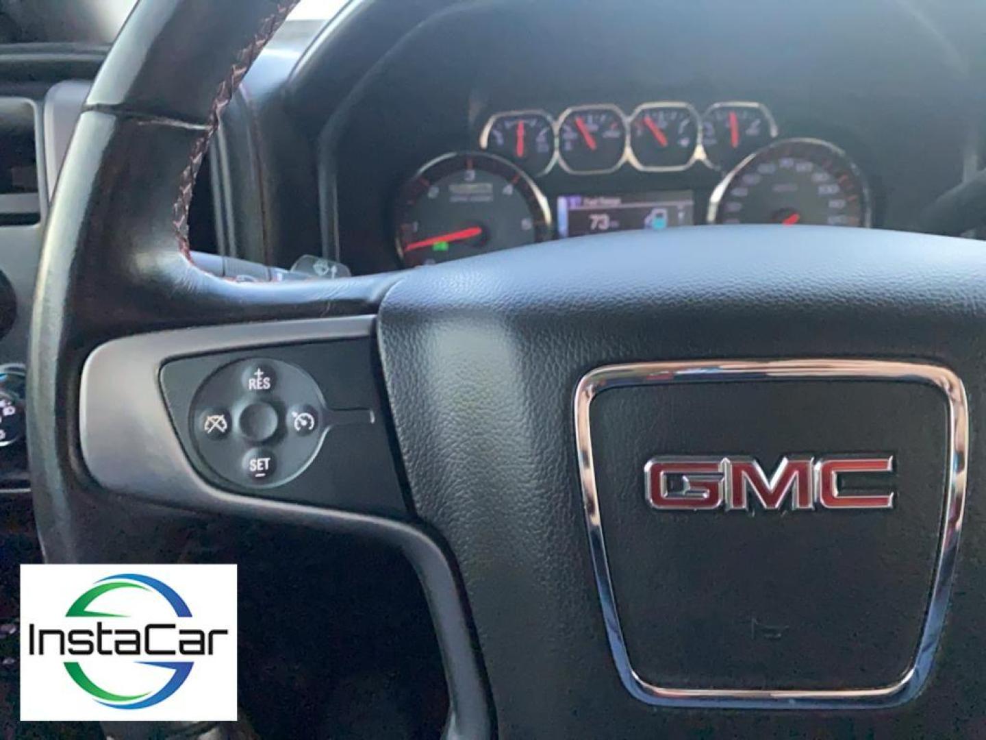 2017 Onyx Black /Jet Black/Spice Red GMC Sierra SLT (3GTU2NEC6HG) with an V8, 5.3L engine, 8-speed automatic transmission, located at 3147 E Independence Blvd, Charlotte, NC, 28205, 35.200268, -80.773651 - <b>Equipment</b><br>Bluetooth technology is built into this GMC Sierra, keeping your hands on the steering wheel and your focus on the road. This model features steering wheel audio controls. An off-road package is equipped on this GMC Sierra. This GMC Sierra keeps you comfortable with Auto Climate. - Photo#29