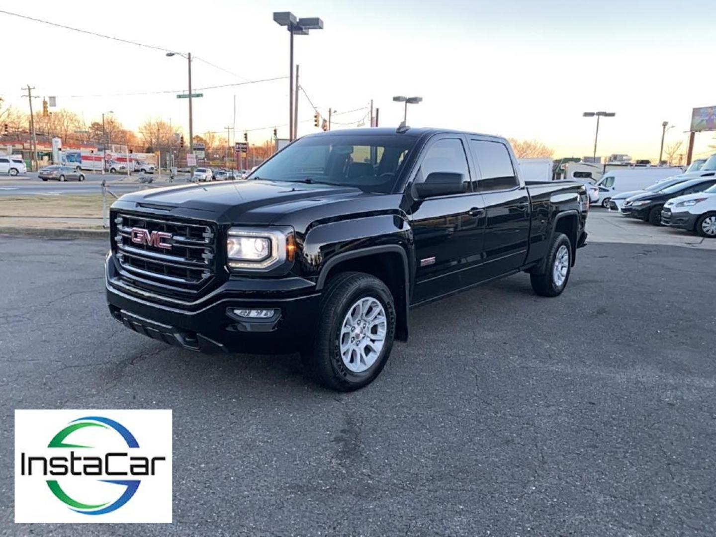 2017 Onyx Black /Jet Black/Spice Red GMC Sierra SLT (3GTU2NEC6HG) with an V8, 5.3L engine, 8-speed automatic transmission, located at 3147 E Independence Blvd, Charlotte, NC, 28205, 35.200268, -80.773651 - <b>Equipment</b><br>Bluetooth technology is built into this GMC Sierra, keeping your hands on the steering wheel and your focus on the road. This model features steering wheel audio controls. An off-road package is equipped on this GMC Sierra. This GMC Sierra keeps you comfortable with Auto Climate. - Photo#8