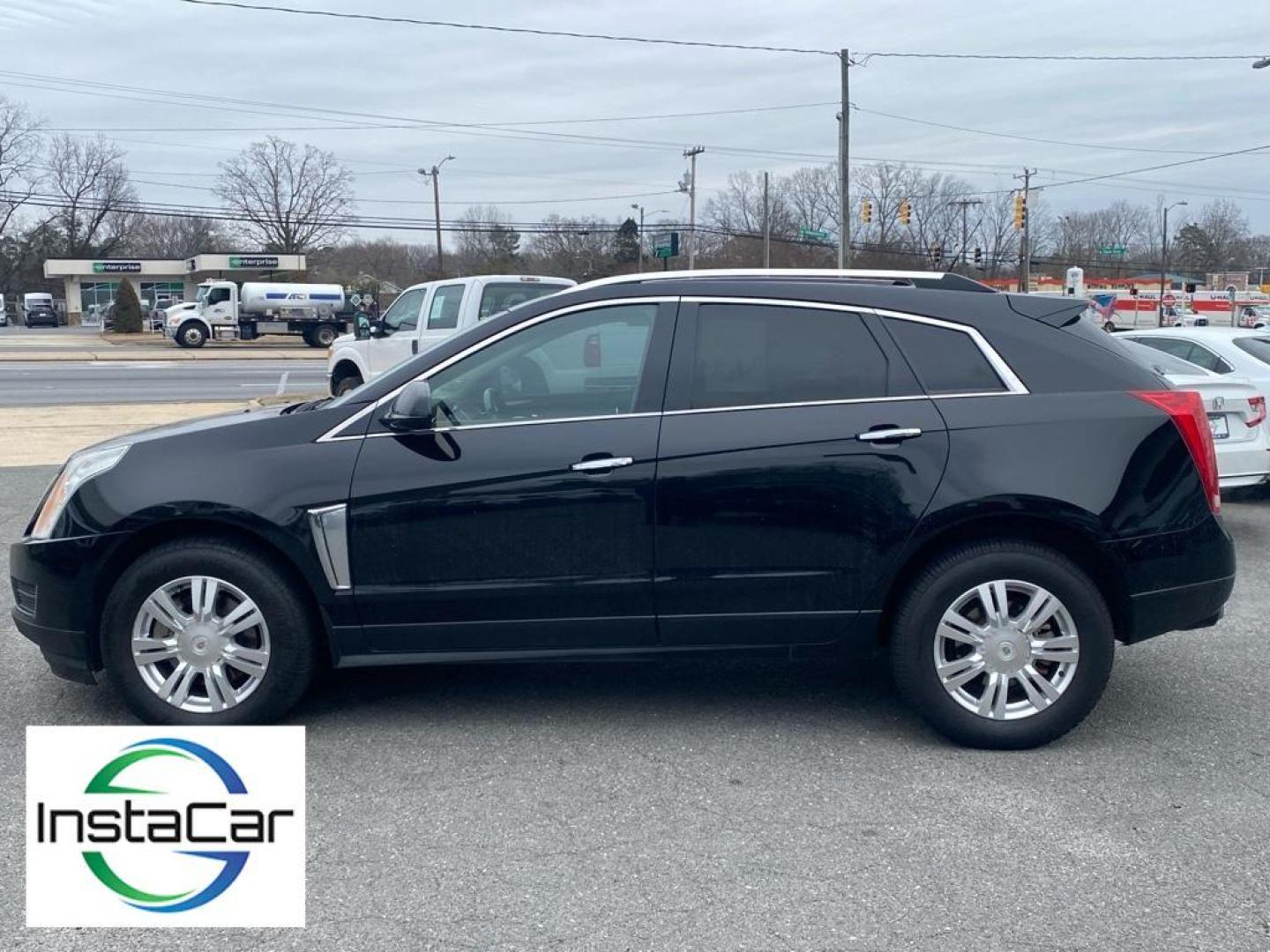 2013 Black Raven /Shale/Brownstone Accents Cadillac SRX Luxury Collection (3GYFNCE30DS) with an V6, 3.6L engine, 6-speed automatic transmission, located at 3147 E Independence Blvd, Charlotte, NC, 28205, 35.200268, -80.773651 - For sale at our dealership: a sophisticated 2013 Cadillac SRX Luxury with Front-Wheel Drive, ready to elevate your driving experience. This stylish crossover is powered by a robust V6, 3.6L engine, providing a perfect blend of performance and efficiency for all your journeys.<br><br>Step inside to d - Photo#9