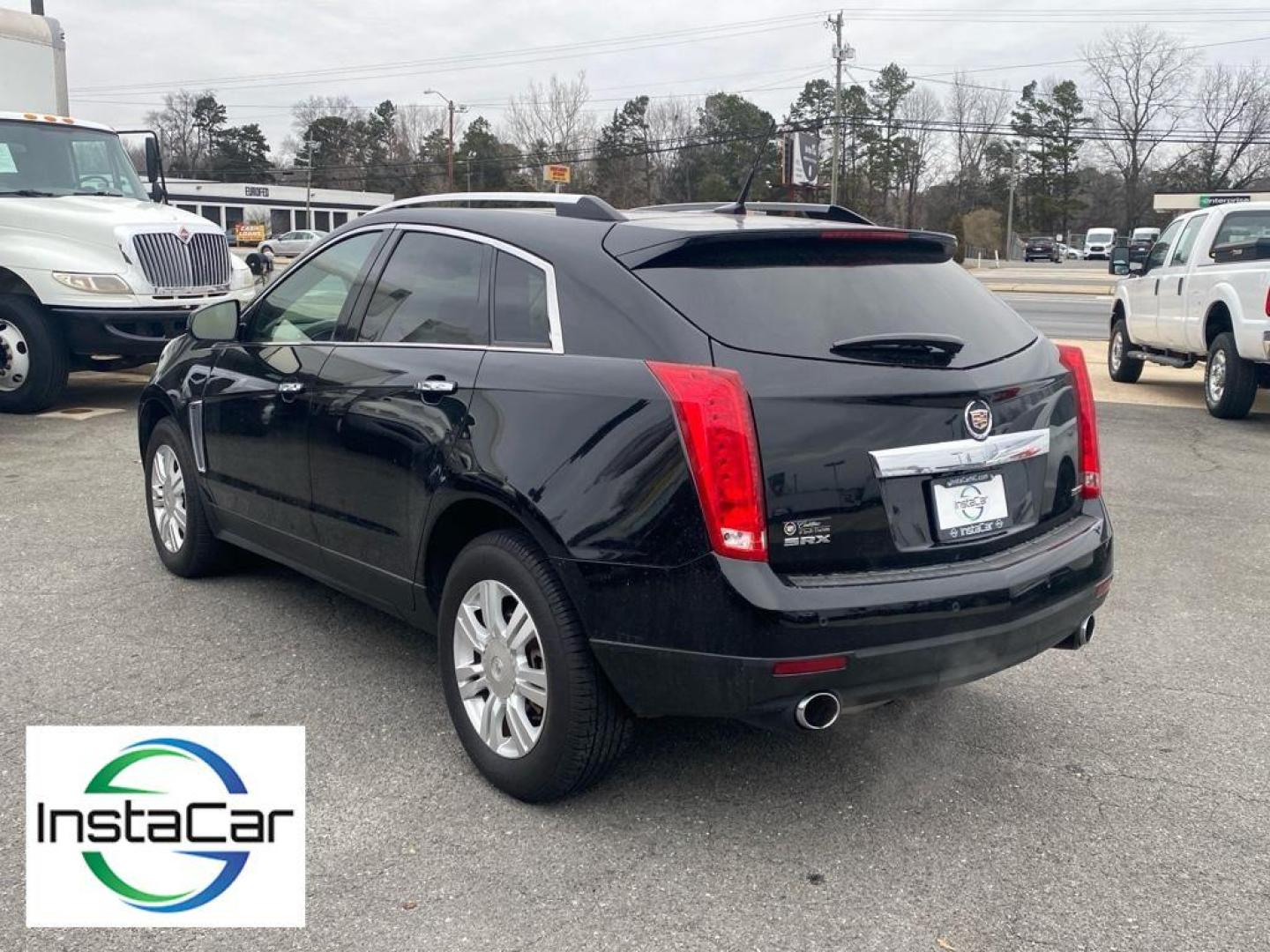 2013 Black Raven /Shale/Brownstone Accents Cadillac SRX Luxury Collection (3GYFNCE30DS) with an V6, 3.6L engine, 6-speed automatic transmission, located at 3147 E Independence Blvd, Charlotte, NC, 28205, 35.200268, -80.773651 - For sale at our dealership: a sophisticated 2013 Cadillac SRX Luxury with Front-Wheel Drive, ready to elevate your driving experience. This stylish crossover is powered by a robust V6, 3.6L engine, providing a perfect blend of performance and efficiency for all your journeys.<br><br>Step inside to d - Photo#10