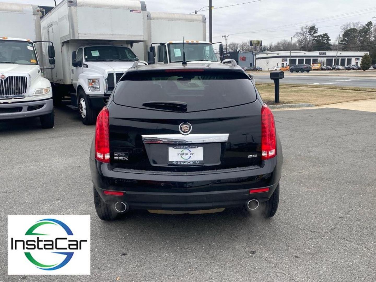 2013 Black Raven /Shale/Brownstone Accents Cadillac SRX Luxury Collection (3GYFNCE30DS) with an V6, 3.6L engine, 6-speed automatic transmission, located at 3147 E Independence Blvd, Charlotte, NC, 28205, 35.200268, -80.773651 - For sale at our dealership: a sophisticated 2013 Cadillac SRX Luxury with Front-Wheel Drive, ready to elevate your driving experience. This stylish crossover is powered by a robust V6, 3.6L engine, providing a perfect blend of performance and efficiency for all your journeys.<br><br>Step inside to d - Photo#11