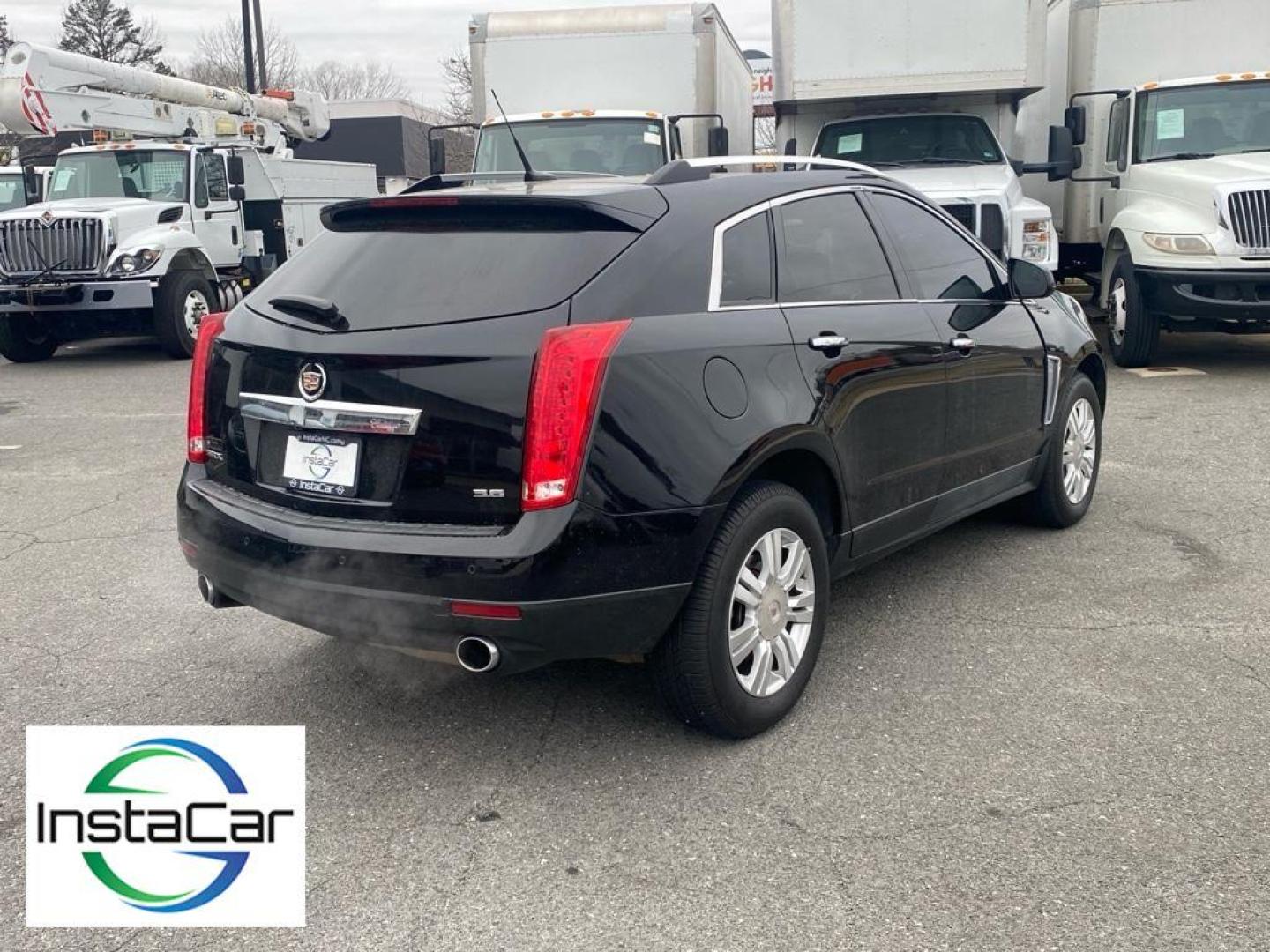 2013 Black Raven /Shale/Brownstone Accents Cadillac SRX Luxury Collection (3GYFNCE30DS) with an V6, 3.6L engine, 6-speed automatic transmission, located at 3147 E Independence Blvd, Charlotte, NC, 28205, 35.200268, -80.773651 - For sale at our dealership: a sophisticated 2013 Cadillac SRX Luxury with Front-Wheel Drive, ready to elevate your driving experience. This stylish crossover is powered by a robust V6, 3.6L engine, providing a perfect blend of performance and efficiency for all your journeys.<br><br>Step inside to d - Photo#12