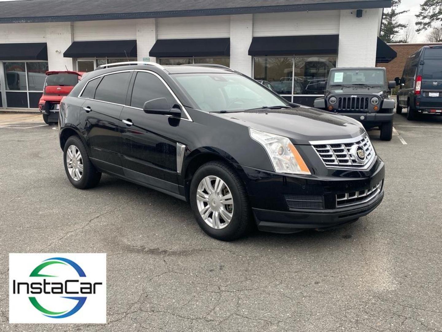 2013 Black Raven /Shale/Brownstone Accents Cadillac SRX Luxury Collection (3GYFNCE30DS) with an V6, 3.6L engine, 6-speed automatic transmission, located at 3147 E Independence Blvd, Charlotte, NC, 28205, 35.200268, -80.773651 - For sale at our dealership: a sophisticated 2013 Cadillac SRX Luxury with Front-Wheel Drive, ready to elevate your driving experience. This stylish crossover is powered by a robust V6, 3.6L engine, providing a perfect blend of performance and efficiency for all your journeys.<br><br>Step inside to d - Photo#6