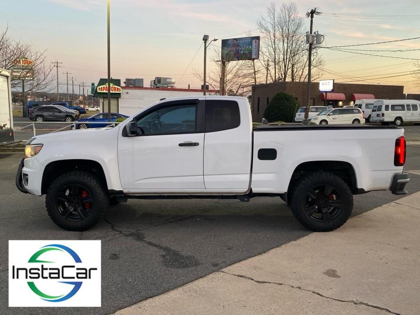 2015 Summit White /Jet Black/Dark Ash Chevrolet Colorado 2WD WT (1GCHSAEA1F1) with an 4 Cyl, 2.5L engine, 6-speed automatic transmission, located at 3147 E Independence Blvd, Charlotte, NC, 28205, 35.200268, -80.773651 - <b>Equipment</b><br>See what's behind you with the back up camera on it. Maintaining a stable interior temperature in this Chevrolet Colorado is easy with the climate control system. This vehicle is rear wheel drive. This unit shines with clean polished lines coated with an elegant white finish. Thi - Photo#7