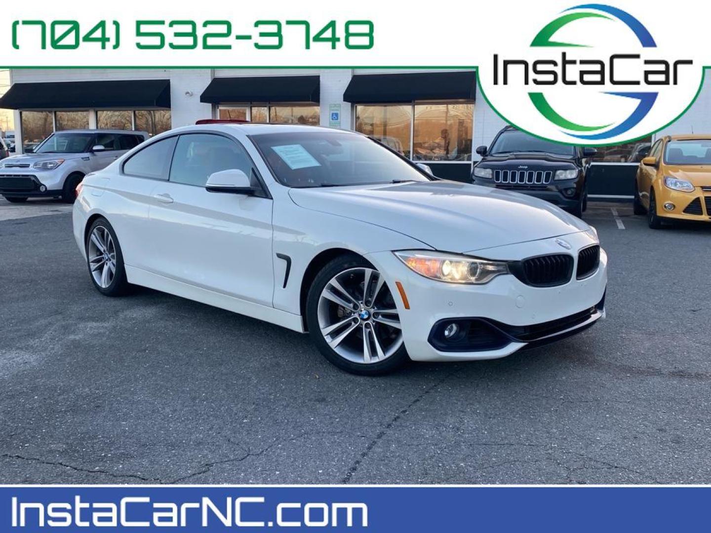 2016 Alpine White /Coral Red w/Black Highlight BMW 4 series 428i (WBA3N7C57GK) with an 4 Cyl, 2.0L engine, 8-speed automatic transmission, located at 3147 E Independence Blvd, Charlotte, NC, 28205, 35.200268, -80.773651 - Photo#0