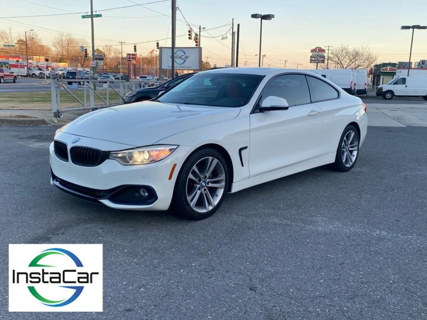 2016 Alpine White /Coral Red w/Black Highlight BMW 4 series 428i (WBA3N7C57GK) with an 4 Cyl, 2.0L engine, 8-speed automatic transmission, located at 3147 E Independence Blvd, Charlotte, NC, 28205, 35.200268, -80.773651 - Discover the perfect blend of performance and luxury with this 2016 BMW 4 Series 428i, a testament to BMW's engineering excellence and sophisticated design. This stylish coupe, equipped with rear-wheel drive, boasts a dynamic 2.0L 4-cylinder engine that delivers an engaging driving experience with i - Photo#9