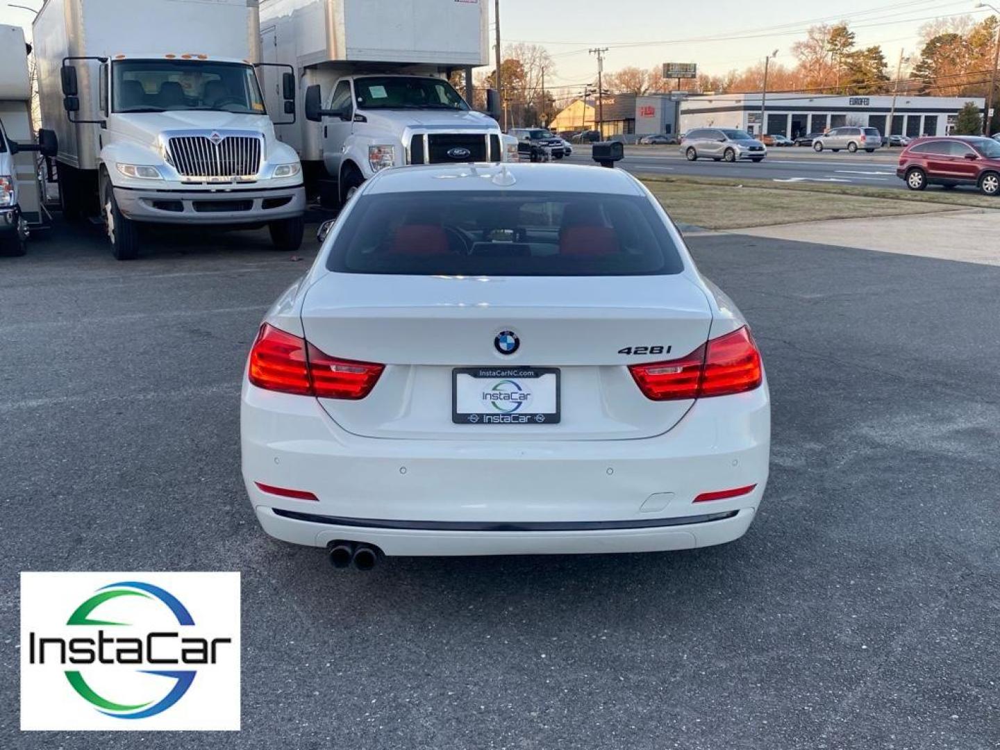 2016 Alpine White /Coral Red w/Black Highlight BMW 4 series 428i (WBA3N7C57GK) with an 4 Cyl, 2.0L engine, 8-speed automatic transmission, located at 3147 E Independence Blvd, Charlotte, NC, 28205, 35.200268, -80.773651 - Discover the perfect blend of performance and luxury with this 2016 BMW 4 Series 428i, a testament to BMW's engineering excellence and sophisticated design. This stylish coupe, equipped with rear-wheel drive, boasts a dynamic 2.0L 4-cylinder engine that delivers an engaging driving experience with i - Photo#12