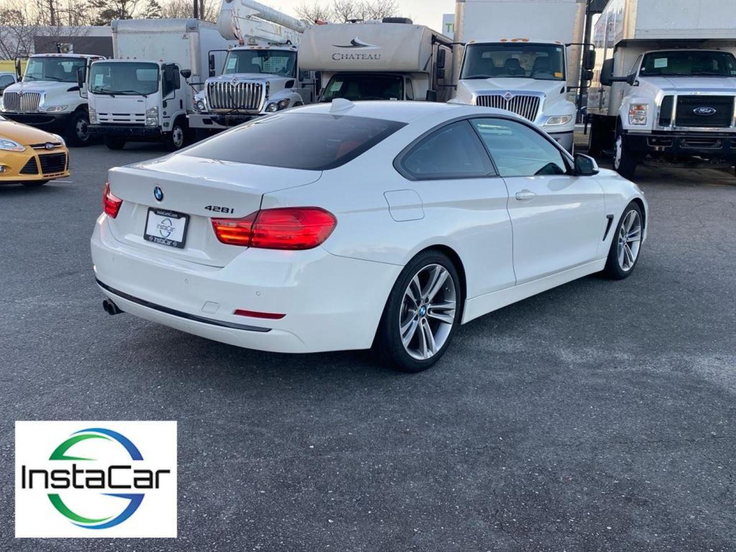 2016 Alpine White /Coral Red w/Black Highlight BMW 4 series 428i (WBA3N7C57GK) with an 4 Cyl, 2.0L engine, 8-speed automatic transmission, located at 3147 E Independence Blvd, Charlotte, NC, 28205, 35.200268, -80.773651 - Discover the perfect blend of performance and luxury with this 2016 BMW 4 Series 428i, a testament to BMW's engineering excellence and sophisticated design. This stylish coupe, equipped with rear-wheel drive, boasts a dynamic 2.0L 4-cylinder engine that delivers an engaging driving experience with i - Photo#13