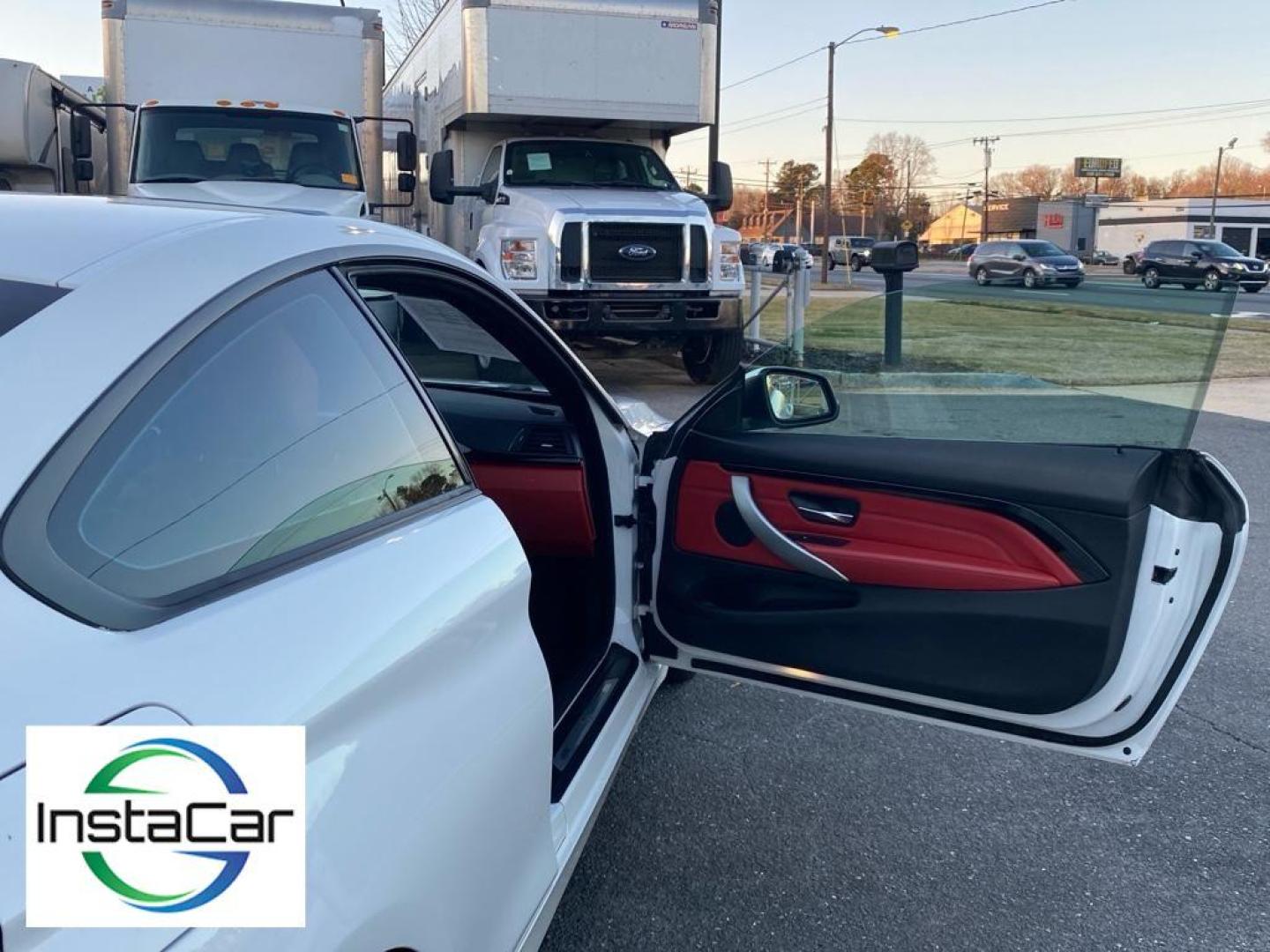 2016 Alpine White /Coral Red w/Black Highlight BMW 4 series 428i (WBA3N7C57GK) with an 4 Cyl, 2.0L engine, 8-speed automatic transmission, located at 3147 E Independence Blvd, Charlotte, NC, 28205, 35.200268, -80.773651 - Photo#21