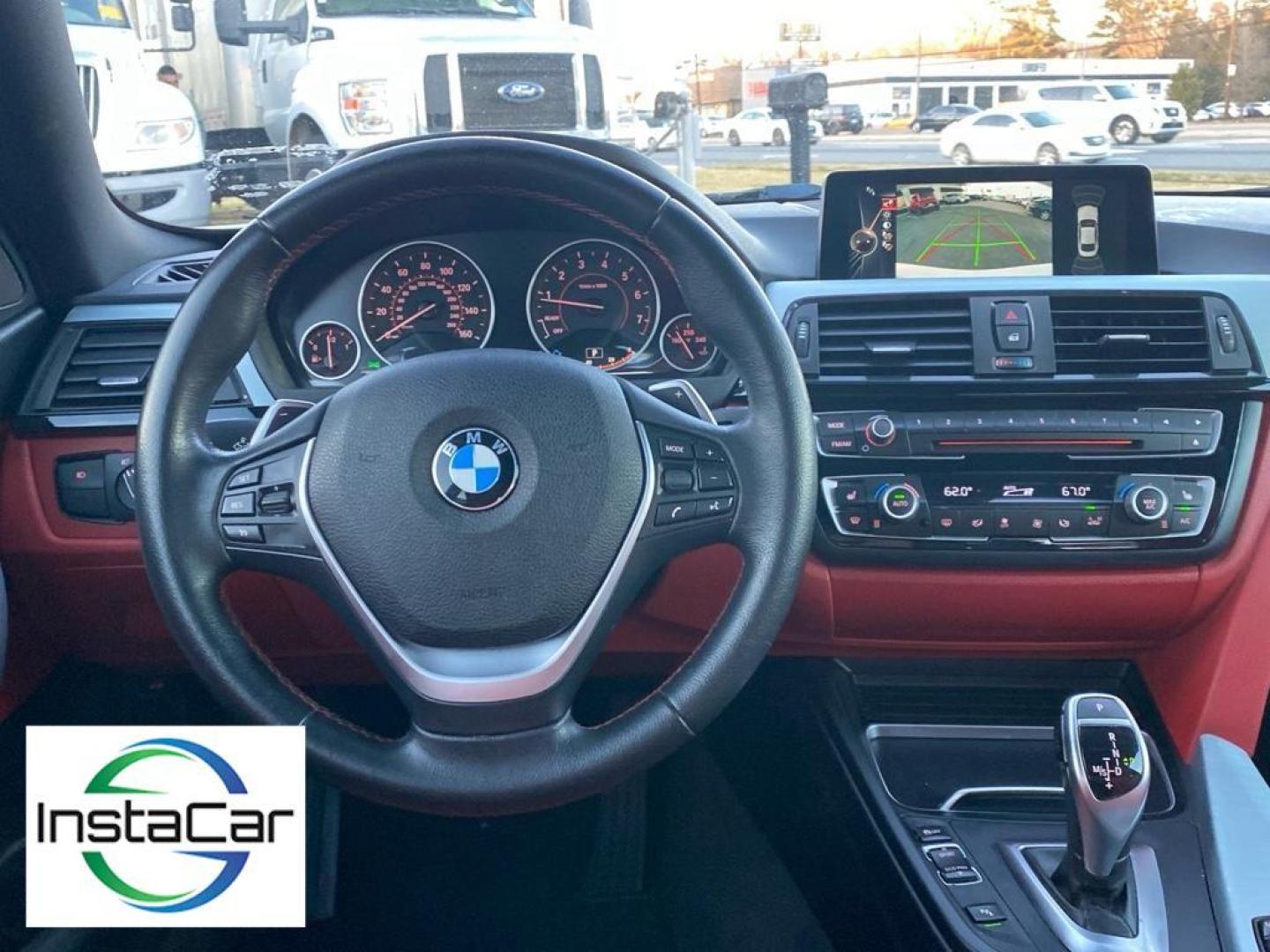 2016 Alpine White /Coral Red w/Black Highlight BMW 4 series 428i (WBA3N7C57GK) with an 4 Cyl, 2.0L engine, 8-speed automatic transmission, located at 3147 E Independence Blvd, Charlotte, NC, 28205, 35.200268, -80.773651 - Discover the perfect blend of performance and luxury with this 2016 BMW 4 Series 428i, a testament to BMW's engineering excellence and sophisticated design. This stylish coupe, equipped with rear-wheel drive, boasts a dynamic 2.0L 4-cylinder engine that delivers an engaging driving experience with i - Photo#27