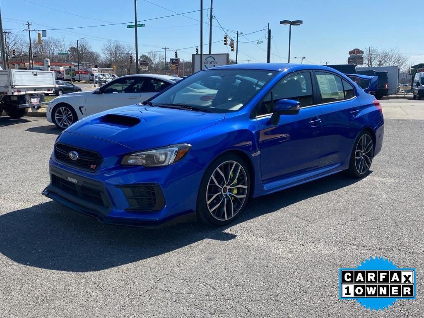 2020 WR Blue Pearl /Black Subaru WRX STI STI (JF1VA2E6XL9) with an 4 Cyl, 2.5L engine, 6-speed manual transmission, located at 3147 E Independence Blvd, Charlotte, NC, 28205, 35.200268, -80.773651 - Discover the exhilaration of driving with this exceptional 2020 Subaru WRX STI, a performance-oriented sedan that seamlessly combines power and precision. Equipped with a robust 4-cylinder, 2.5-liter turbocharged engine, this all-wheel-drive vehicle delivers dynamic handling and impressive accelerat - Photo#7