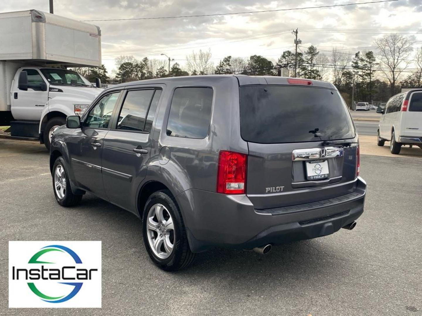 2014 Modern Steel Metallic /Black Honda Pilot EX-L (5FNYF3H53EB) with an V6, 3.5L engine, 5-speed automatic transmission, located at 3147 E Independence Blvd, Charlotte, NC, 28205, 35.200268, -80.773651 - Discover the 2014 Honda Pilot EX-L, a versatile SUV that combines comfort, performance, and advanced technology. Equipped with a robust V6, 3.5L engine, this vehicle delivers a smooth and powerful driving experience, ideal for both city commutes and long road trips.<br><br>The exterior design of the - Photo#9