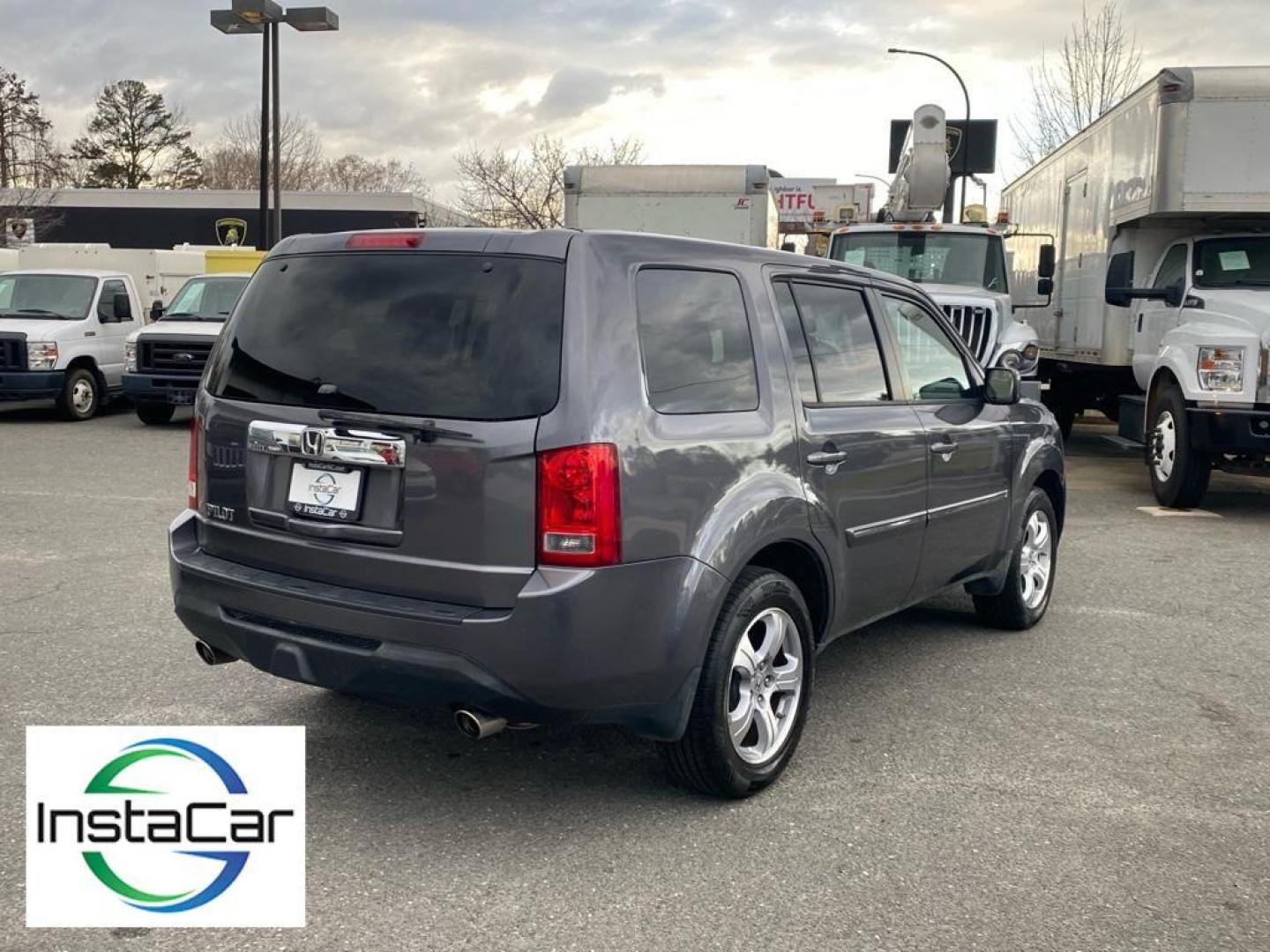 2014 Modern Steel Metallic /Black Honda Pilot EX-L (5FNYF3H53EB) with an V6, 3.5L engine, 5-speed automatic transmission, located at 3147 E Independence Blvd, Charlotte, NC, 28205, 35.200268, -80.773651 - Discover the 2014 Honda Pilot EX-L, a versatile SUV that combines comfort, performance, and advanced technology. Equipped with a robust V6, 3.5L engine, this vehicle delivers a smooth and powerful driving experience, ideal for both city commutes and long road trips.<br><br>The exterior design of the - Photo#11