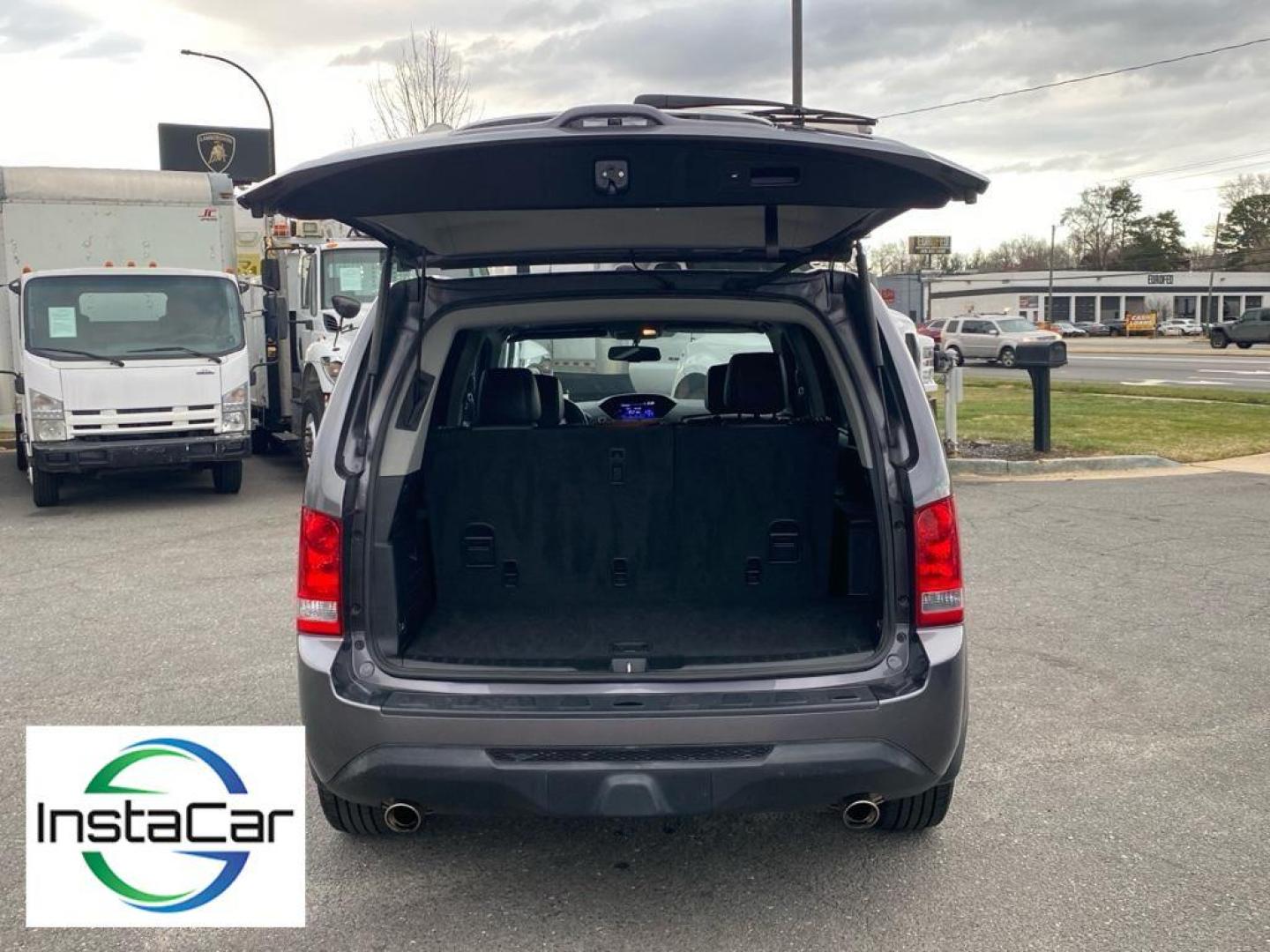 2014 Modern Steel Metallic /Black Honda Pilot EX-L (5FNYF3H53EB) with an V6, 3.5L engine, 5-speed automatic transmission, located at 3147 E Independence Blvd, Charlotte, NC, 28205, 35.200268, -80.773651 - Discover the 2014 Honda Pilot EX-L, a versatile SUV that combines comfort, performance, and advanced technology. Equipped with a robust V6, 3.5L engine, this vehicle delivers a smooth and powerful driving experience, ideal for both city commutes and long road trips.<br><br>The exterior design of the - Photo#30